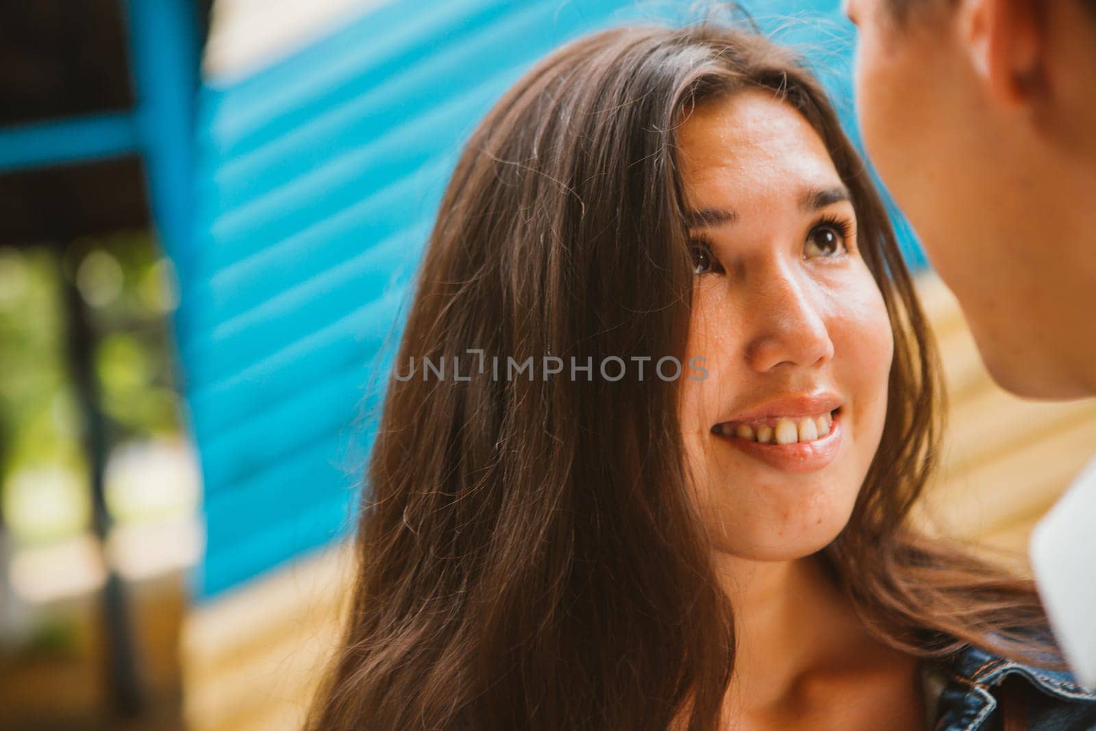 Beautiful young couple on the city background.