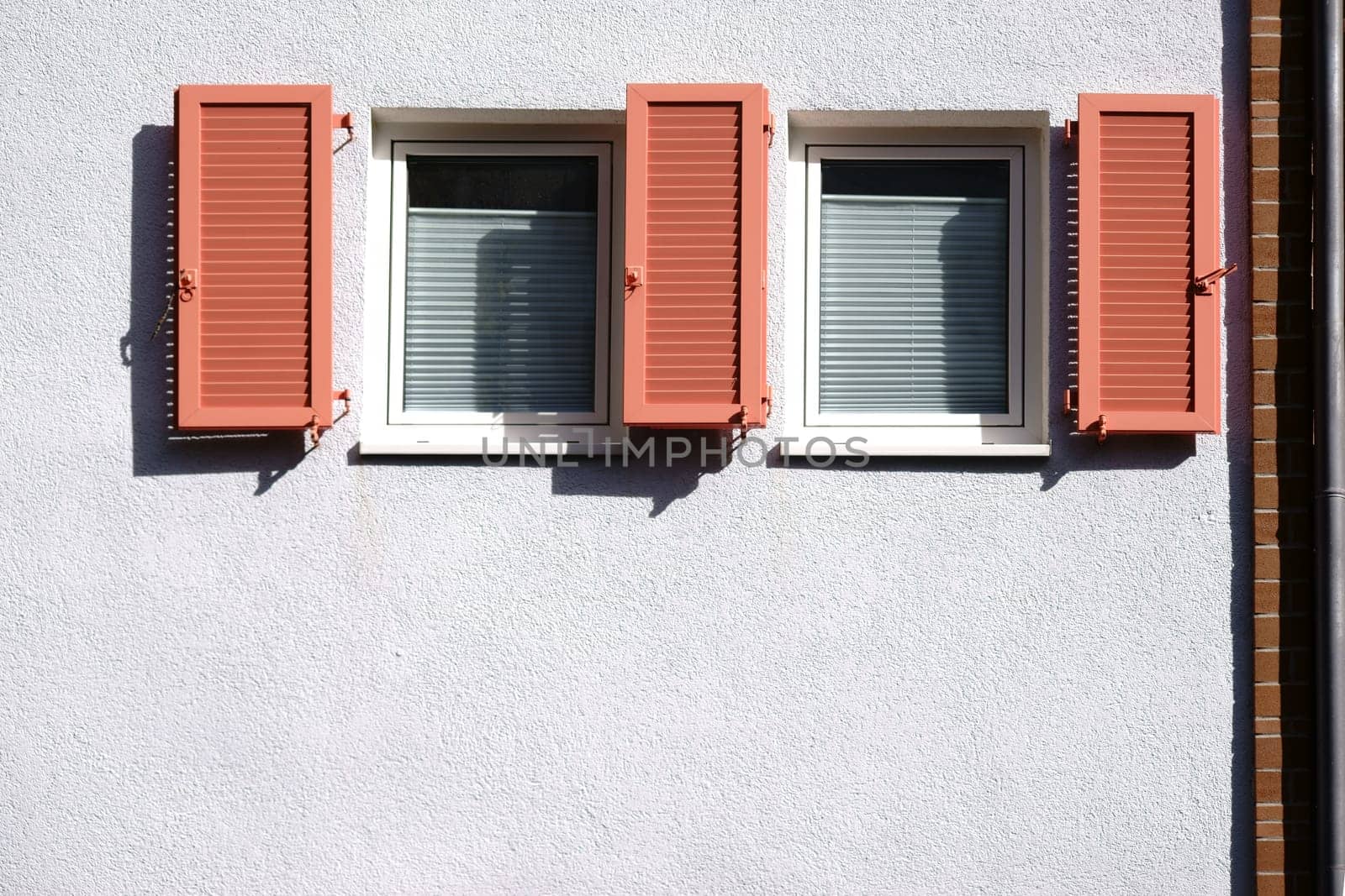 Opened new wooden shutter on a house...