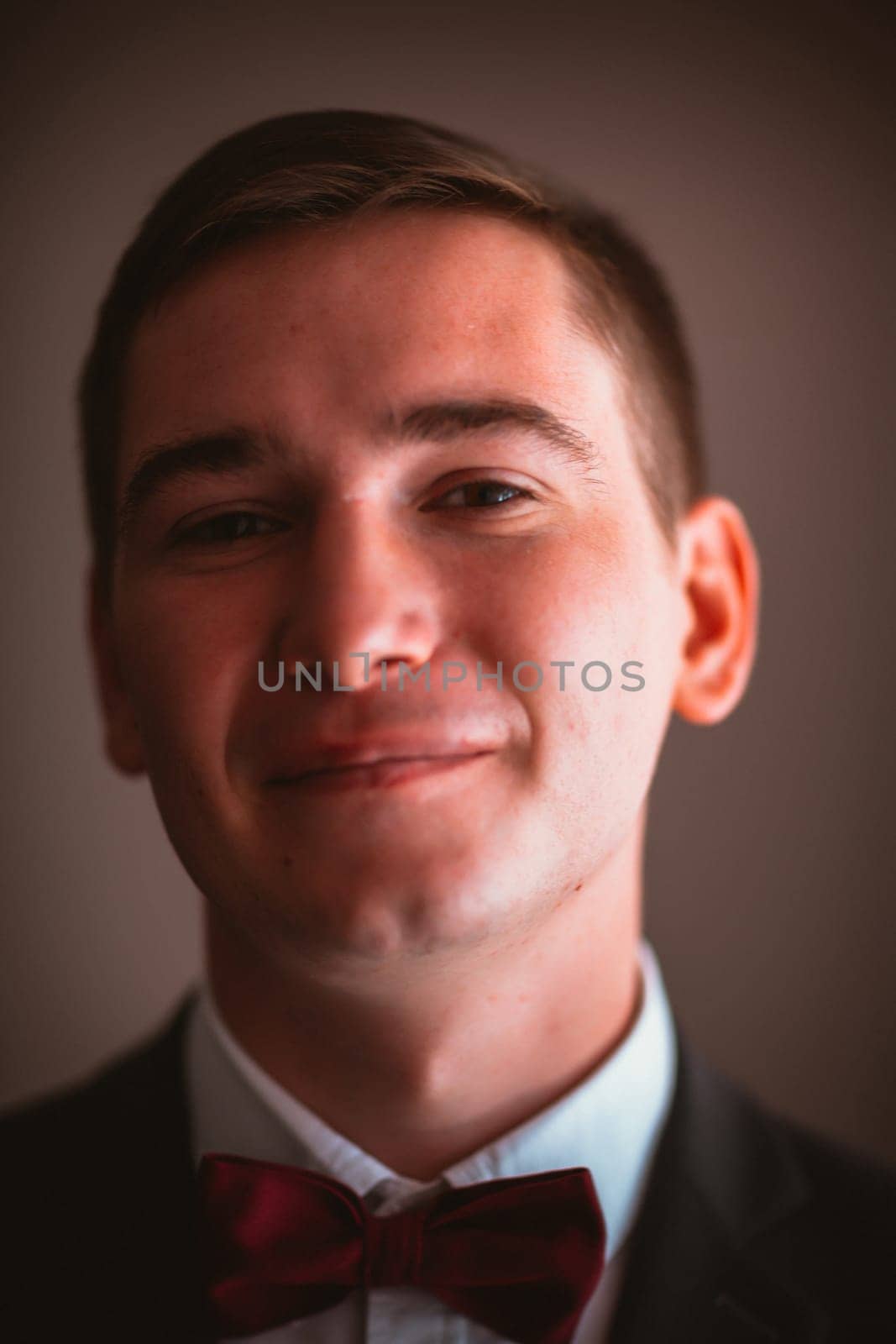 Groom in the background of the window.