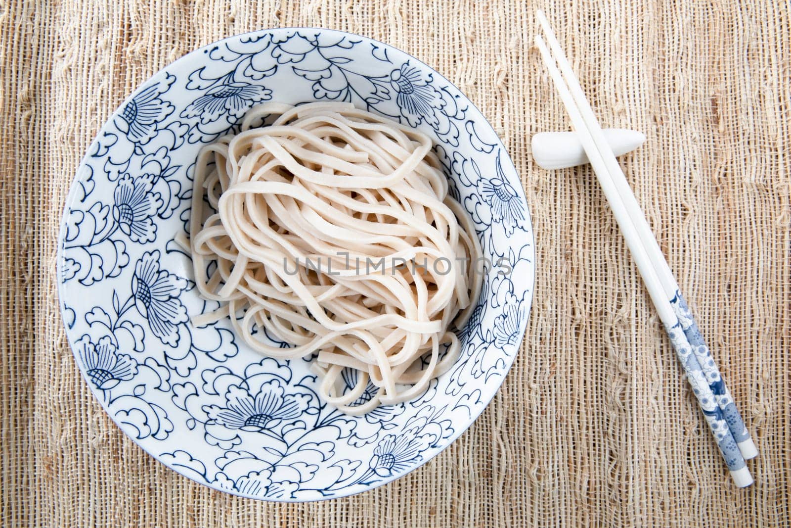 Filling bowl with udon noodle soup series image two: bowl with udon noodls