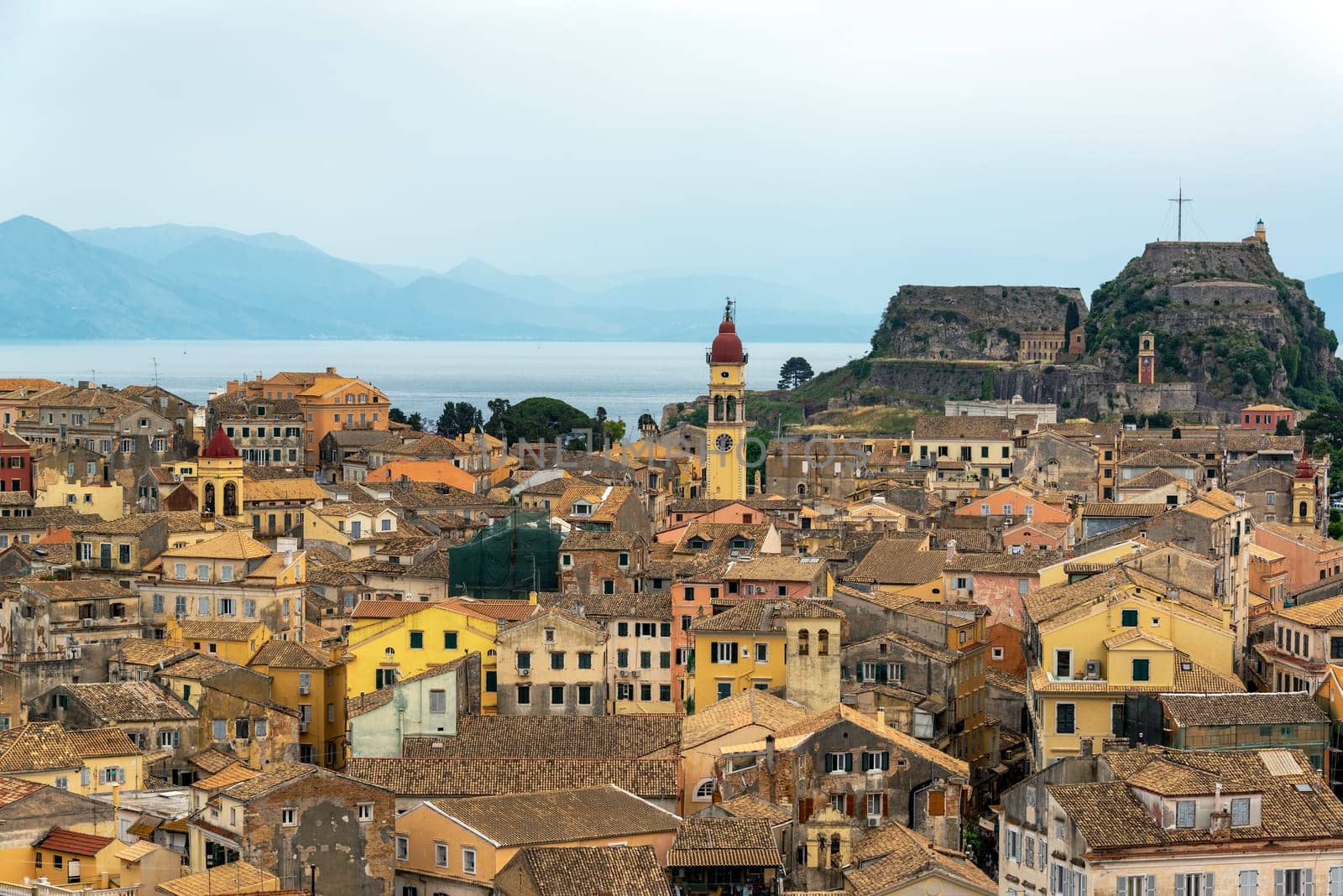 Cityscape of Corfu, Greece with the Old Fortress in the background