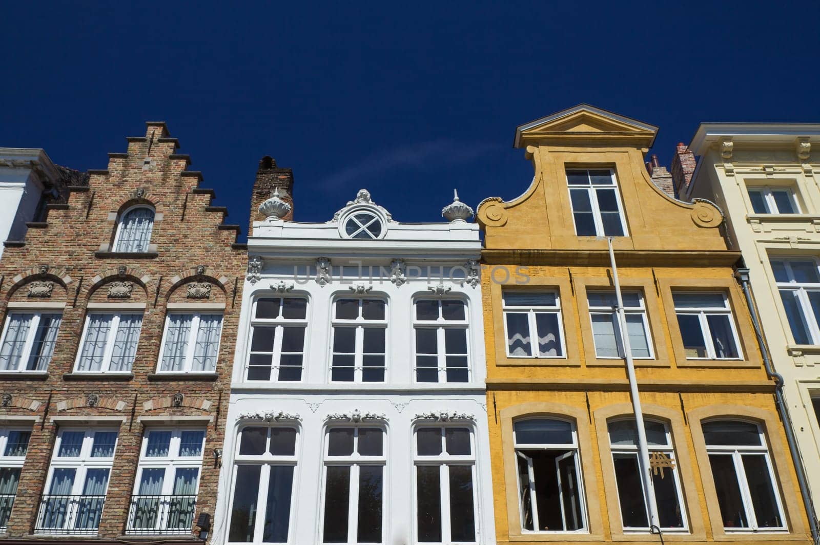 Group of the historic houses in Bruges (Flanders, Belgium). Front view.