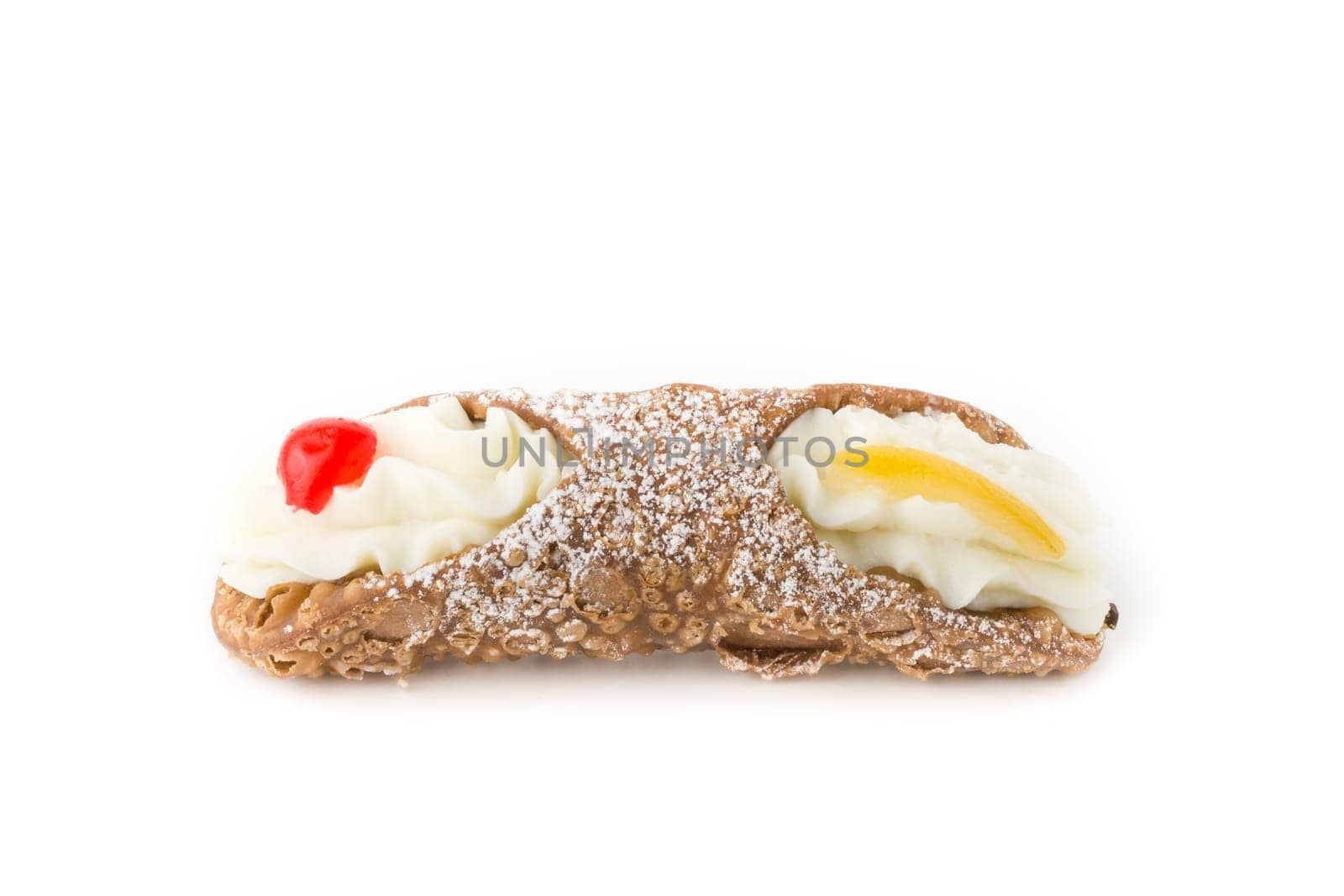 Typical sicilian dessert, cannoli, with candied fruit.