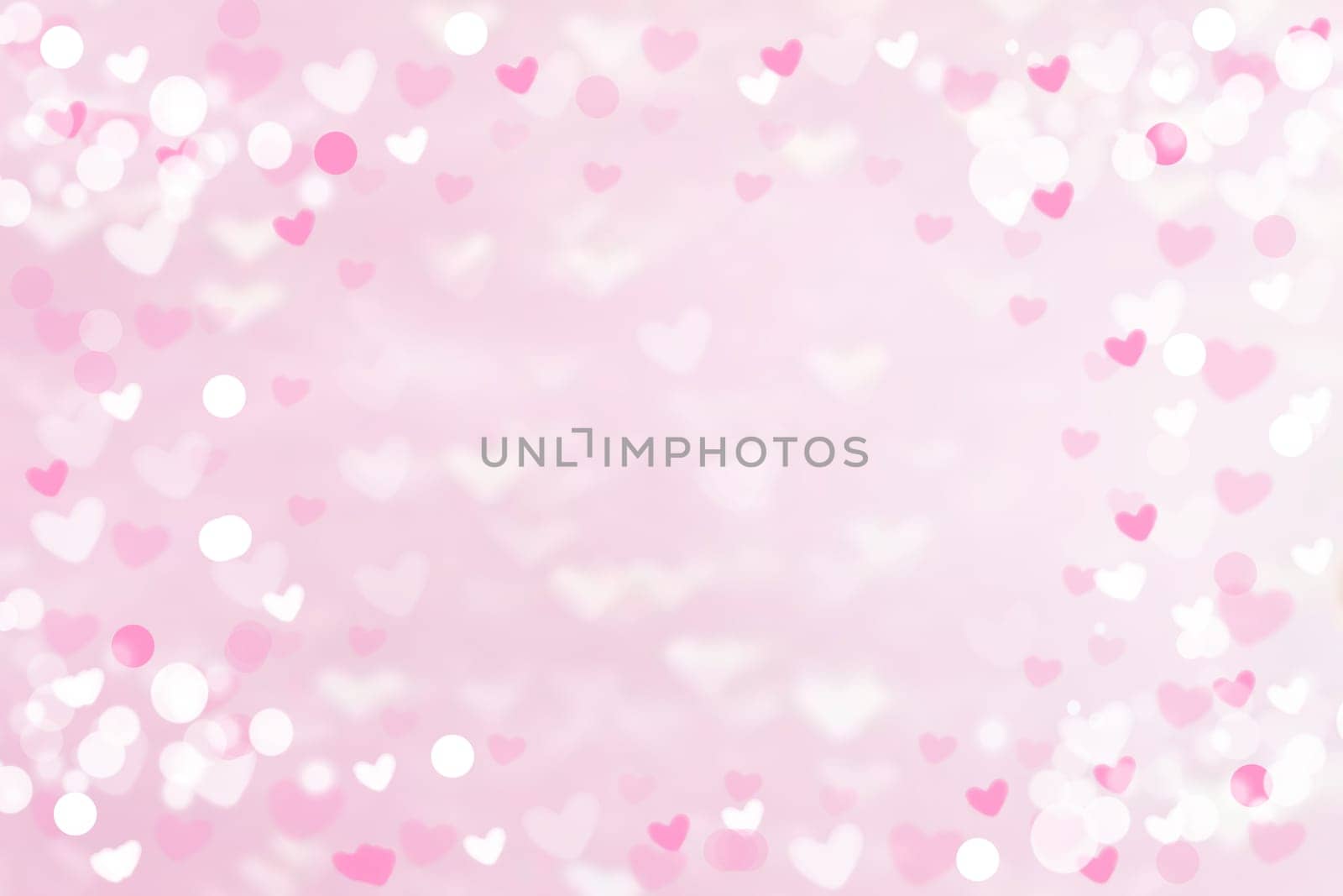 Abstract festive blur bright pink pastel background with pink and white hearts love bokeh for wedding card or Valentine‘s day. Romantic textured backdrop with space for your design. Card concept.