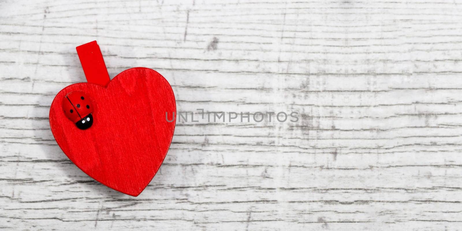 Red hanging hearts with ladybug