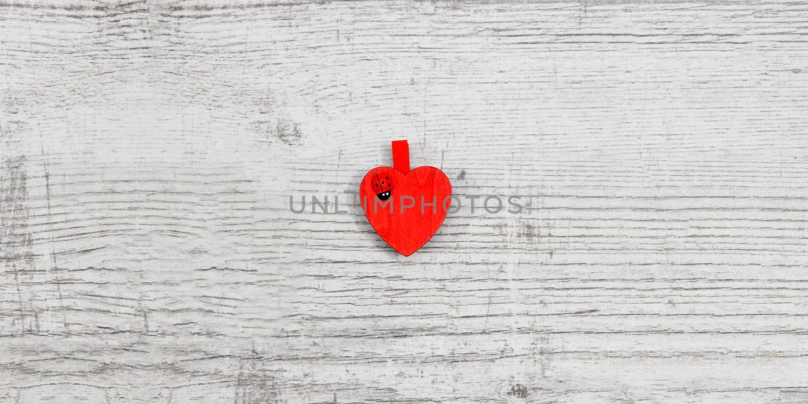 Red hanging hearts with ladybug