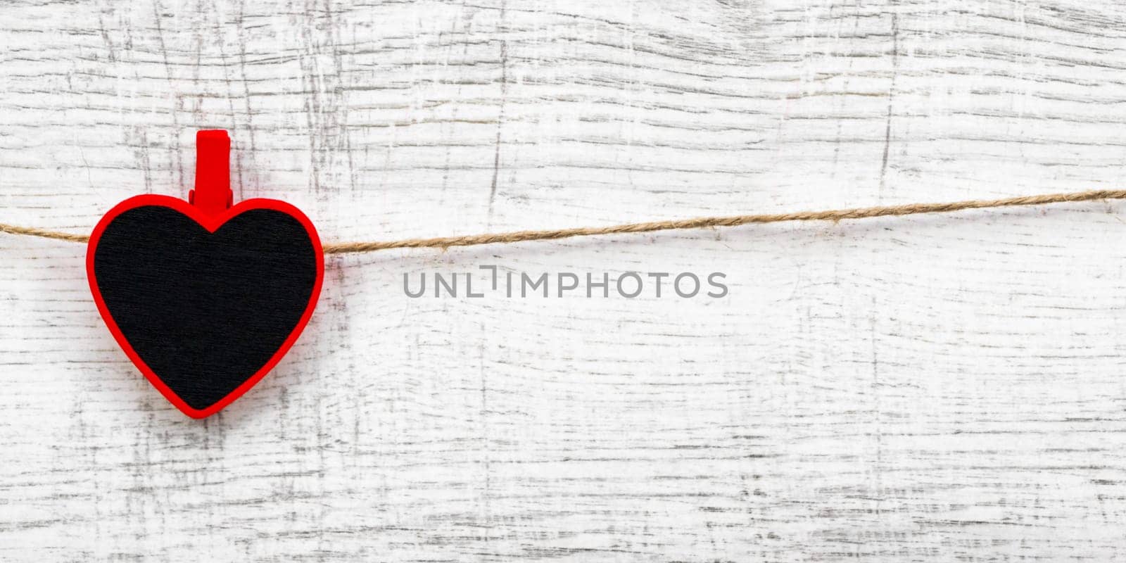 Valentines day with red hearts on wooden background