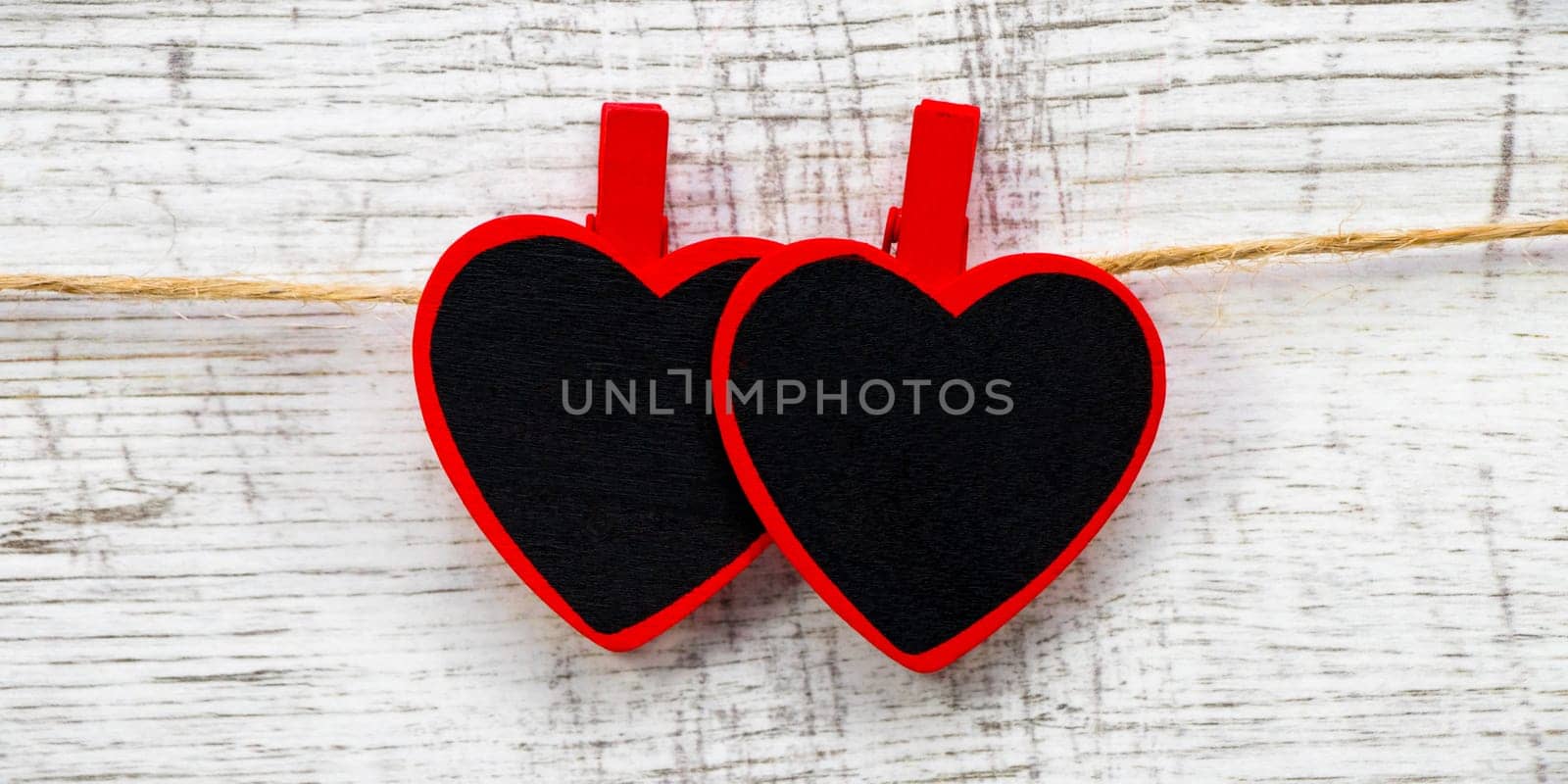 Valentines day with red hearts on wooden background