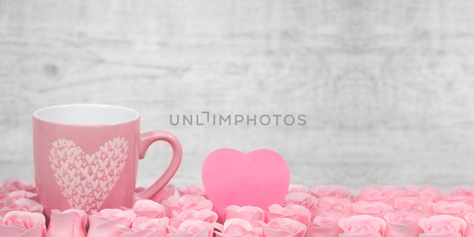 Pink porcelain coffee cup and pink heart roses -Valentines day