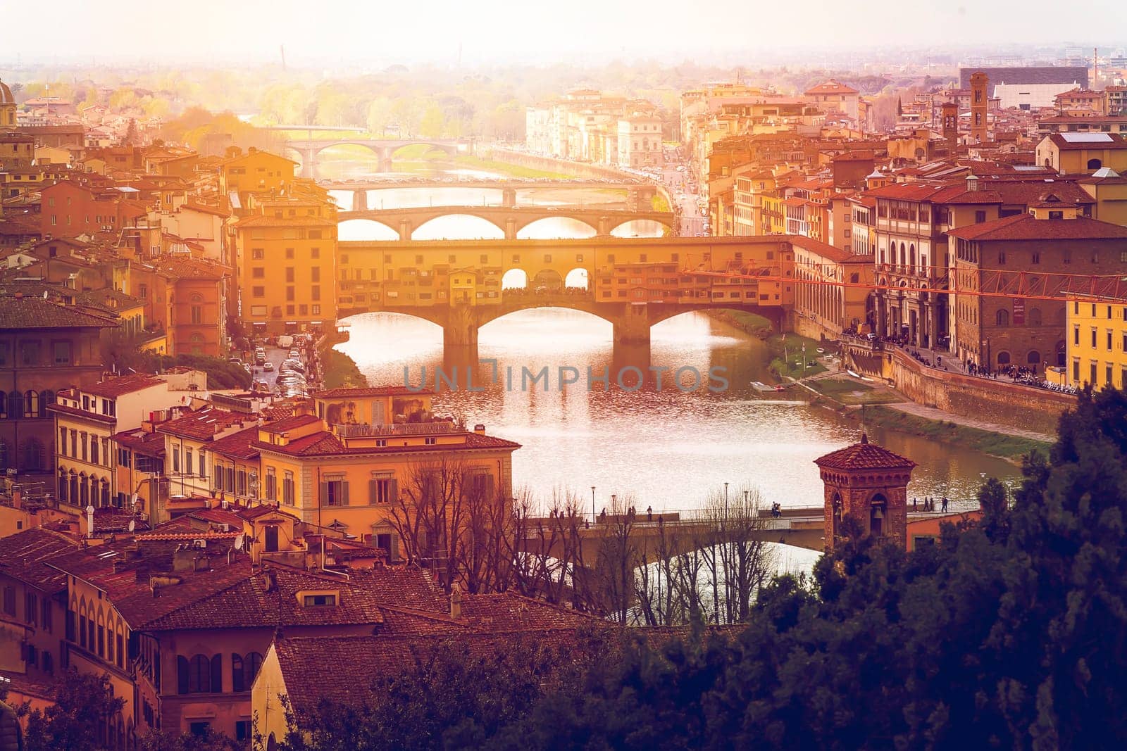 sunset over Ponte Vecchio in Florence. Seasonal concept. Tourism destination