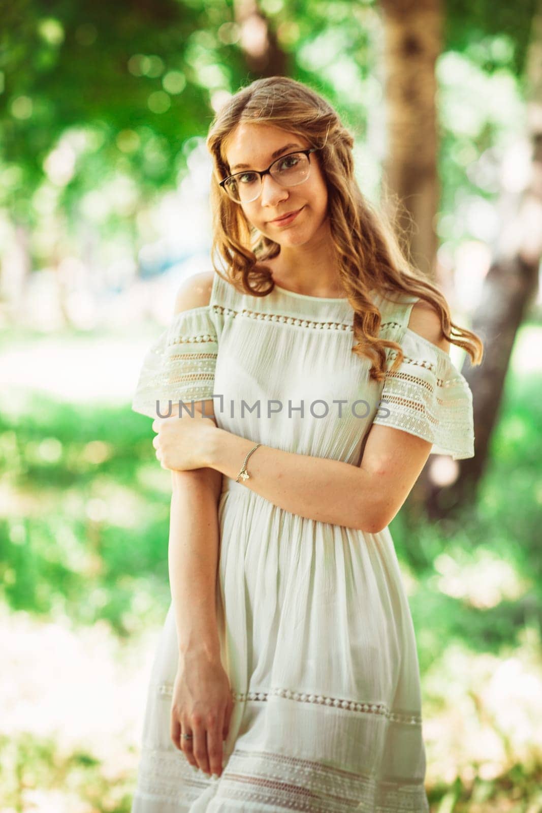 Beautiful young girl on natural background.