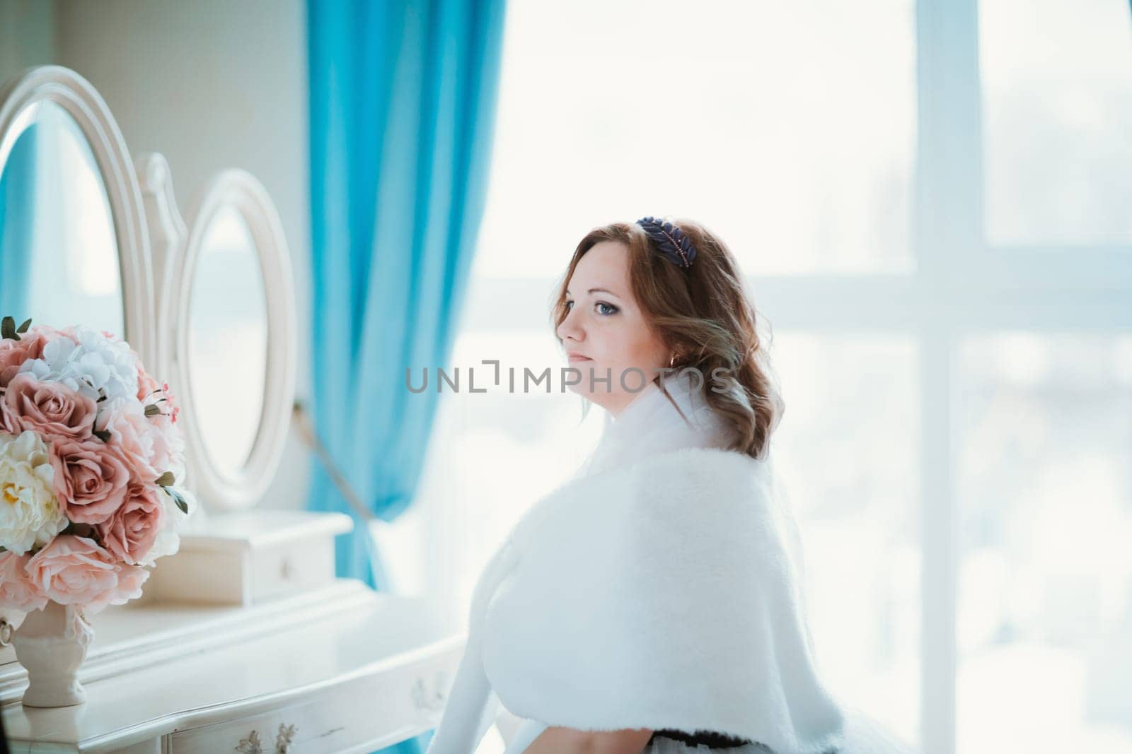 Beauty portrait young bride on light background.