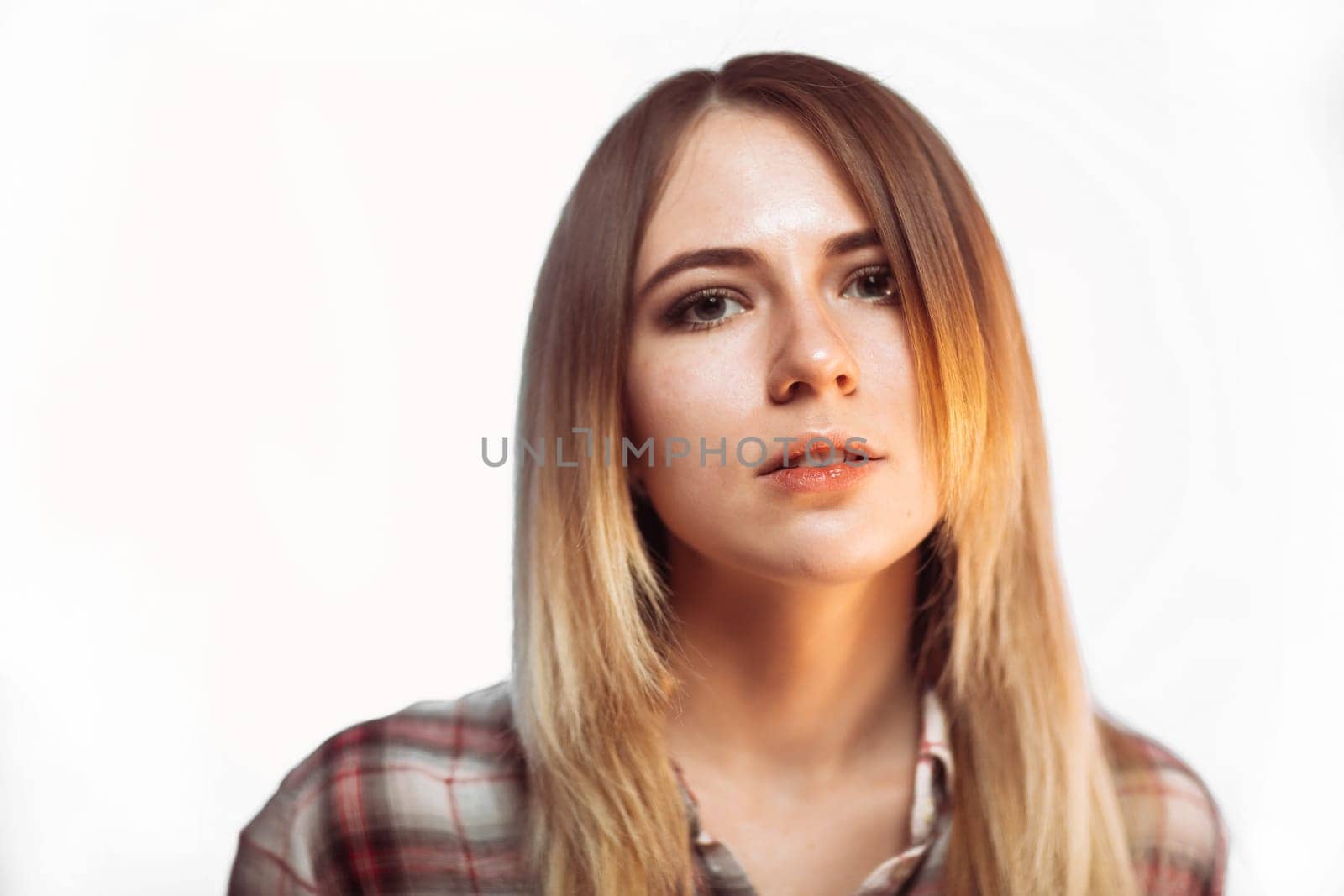 portrait smiling girl on white background in studio.