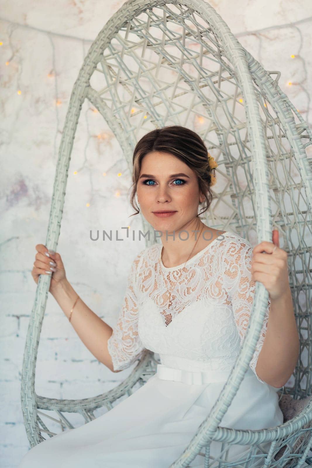 portrait of a bride in white studio.