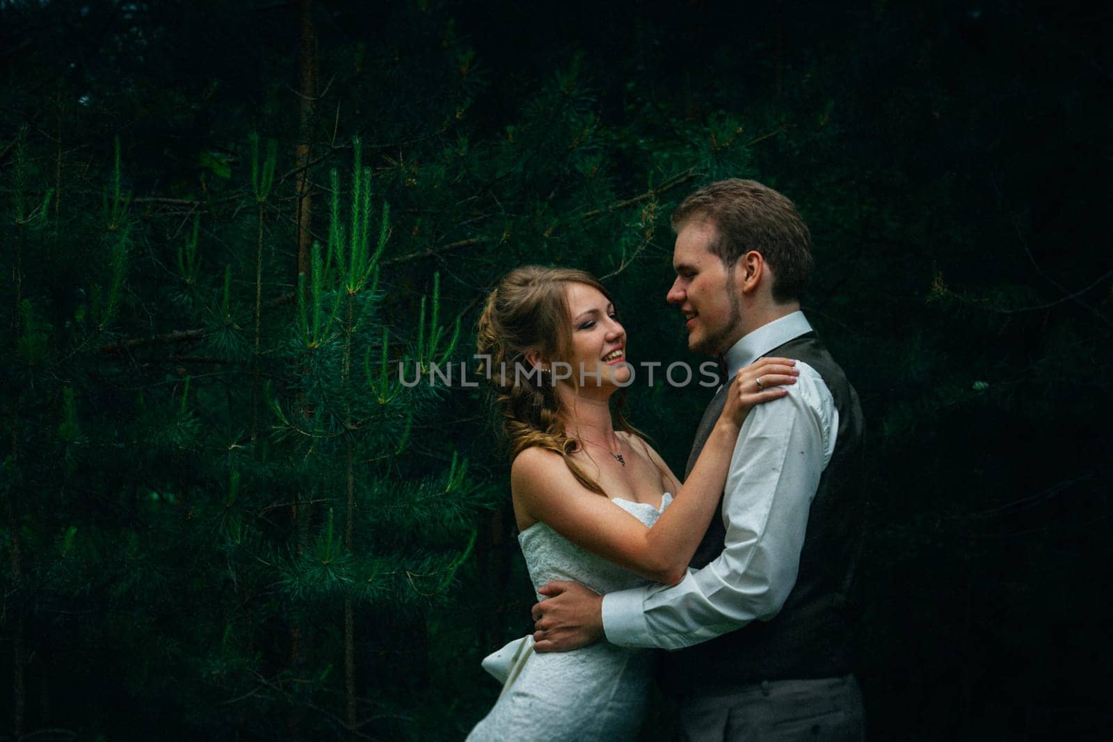 Young bride and groom in the style of provence.