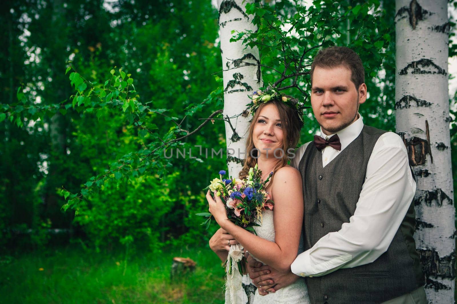 Young bride and groom in the style of provence.