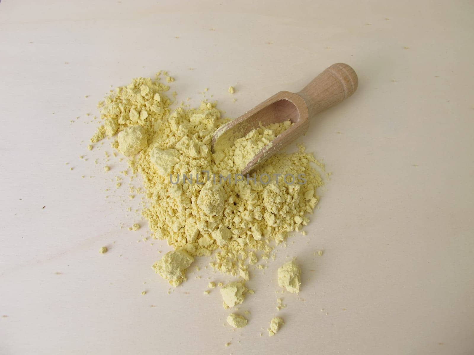 Lupin flour on wooden board