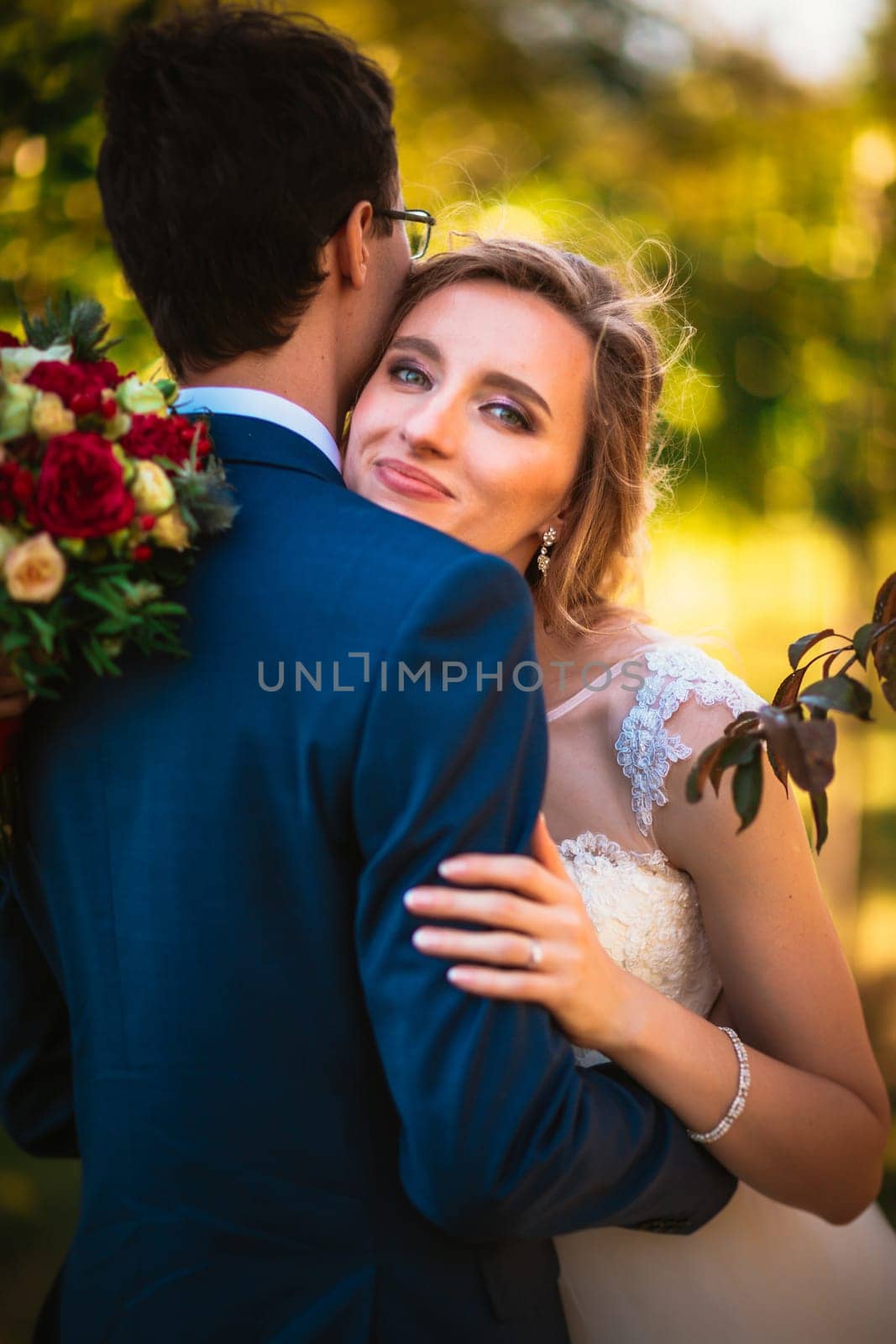 bride and groom on background summer forest.