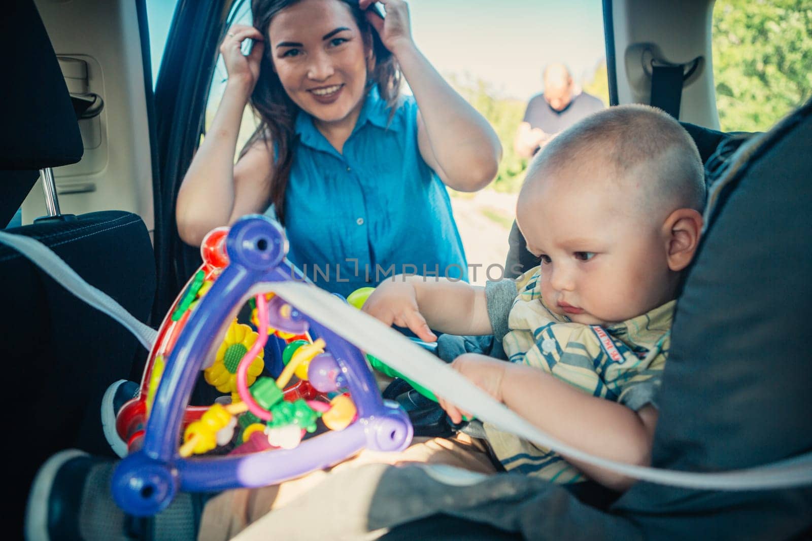 happy mother and toddler son on nature background.