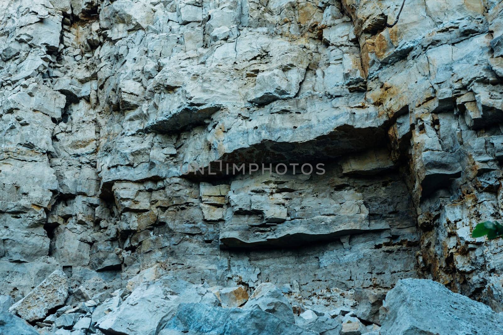 dark detailed grey stone background close up.