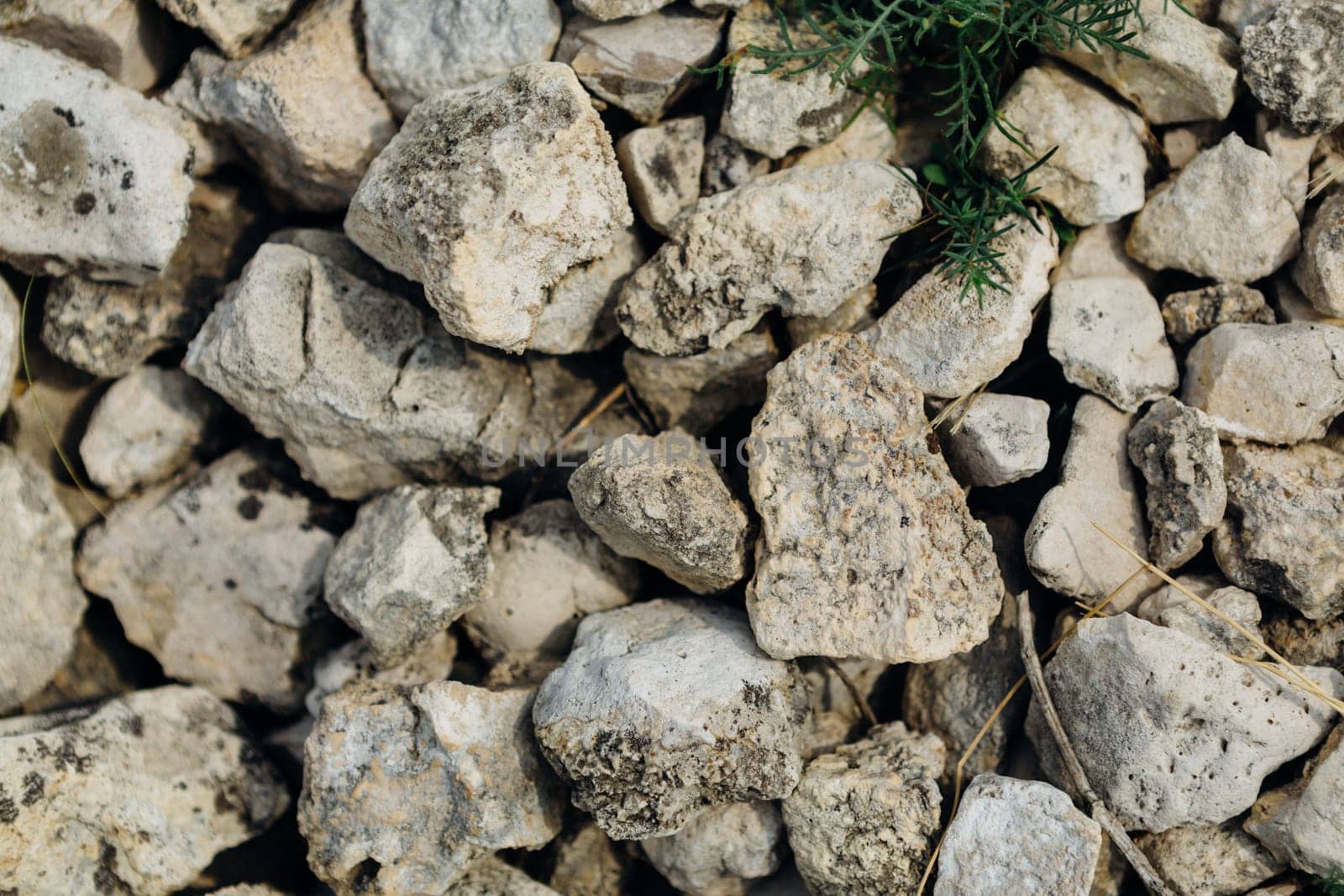 dark detailed grey stone background close up.