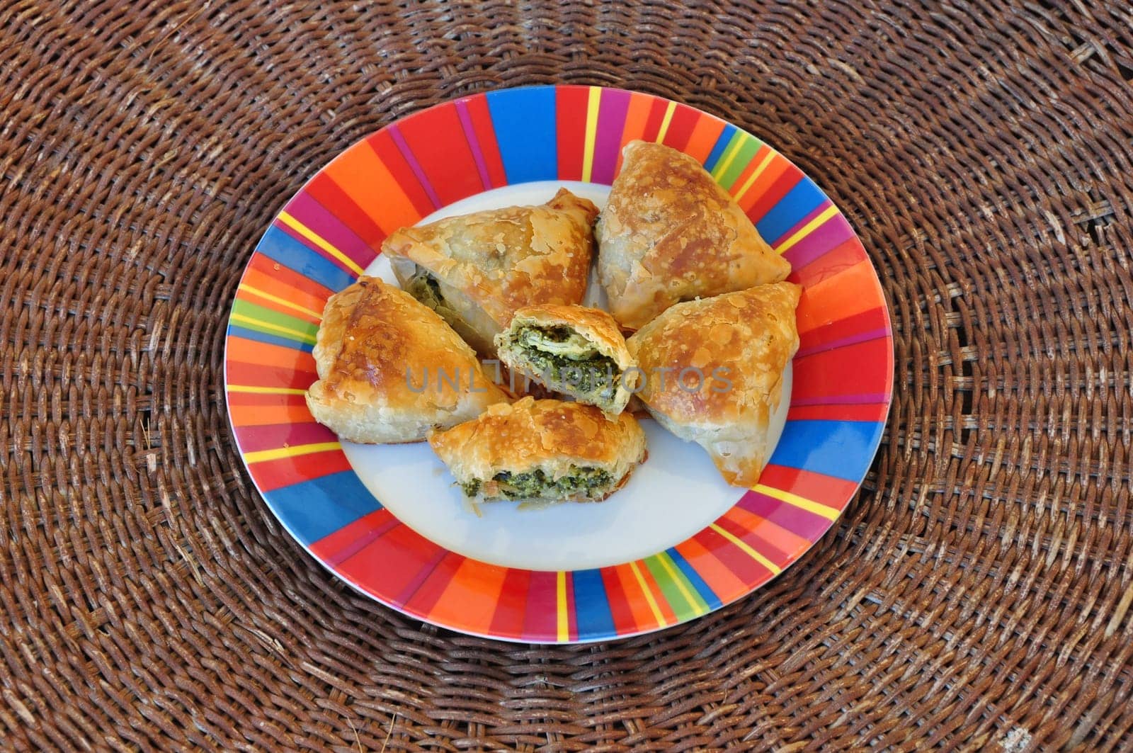 Spanakopita spinach pie with feta cheese and crispy filo dough. Greek food.