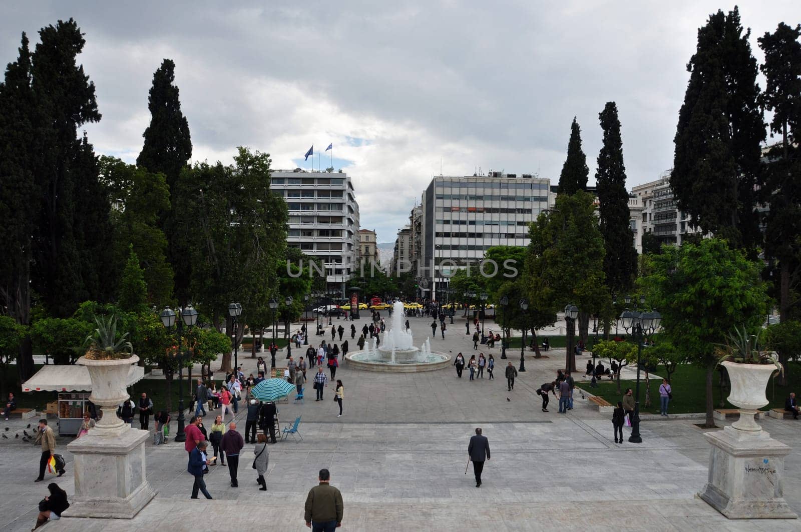 ATHENS, GREECE - MAY 6, 2014: People at Syntagma square in downtown Athens, Greece.