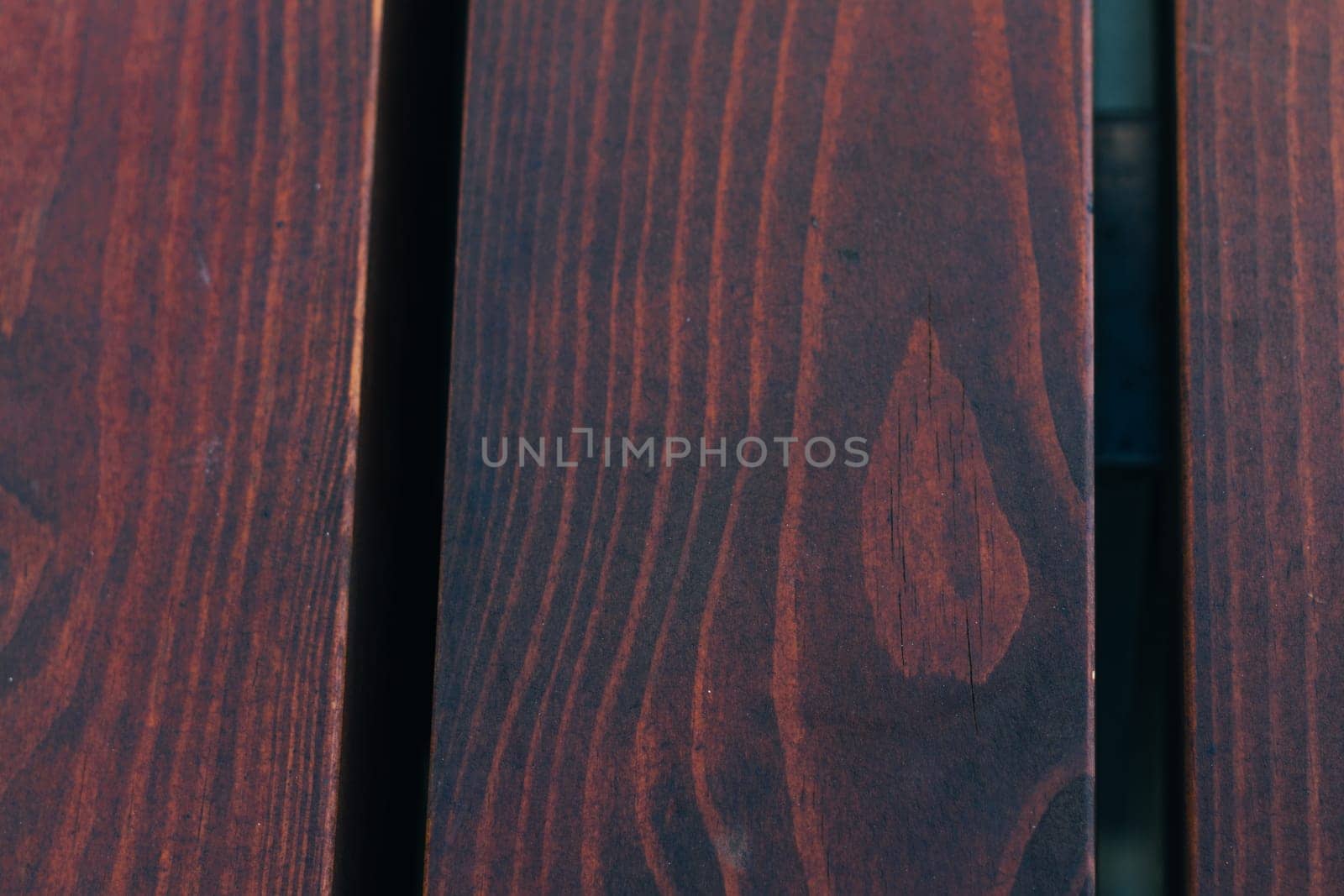 red black wooden background close up.
