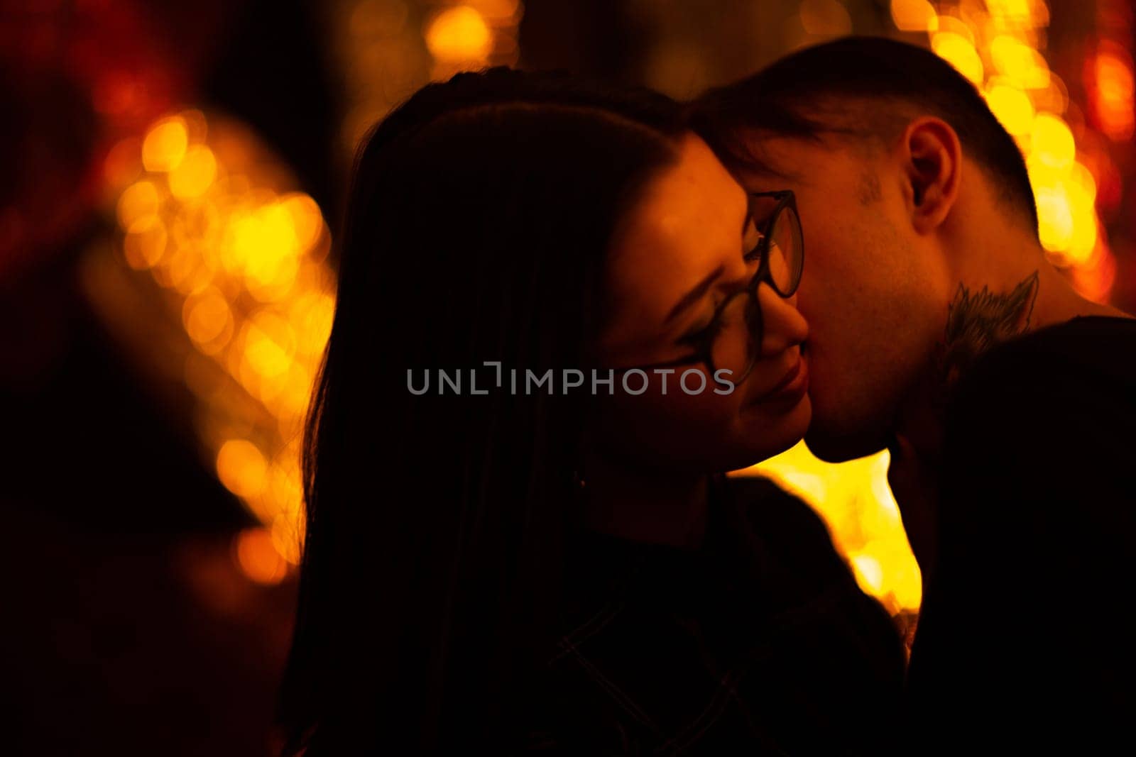 Girl and boyfriend on light sunshine background.