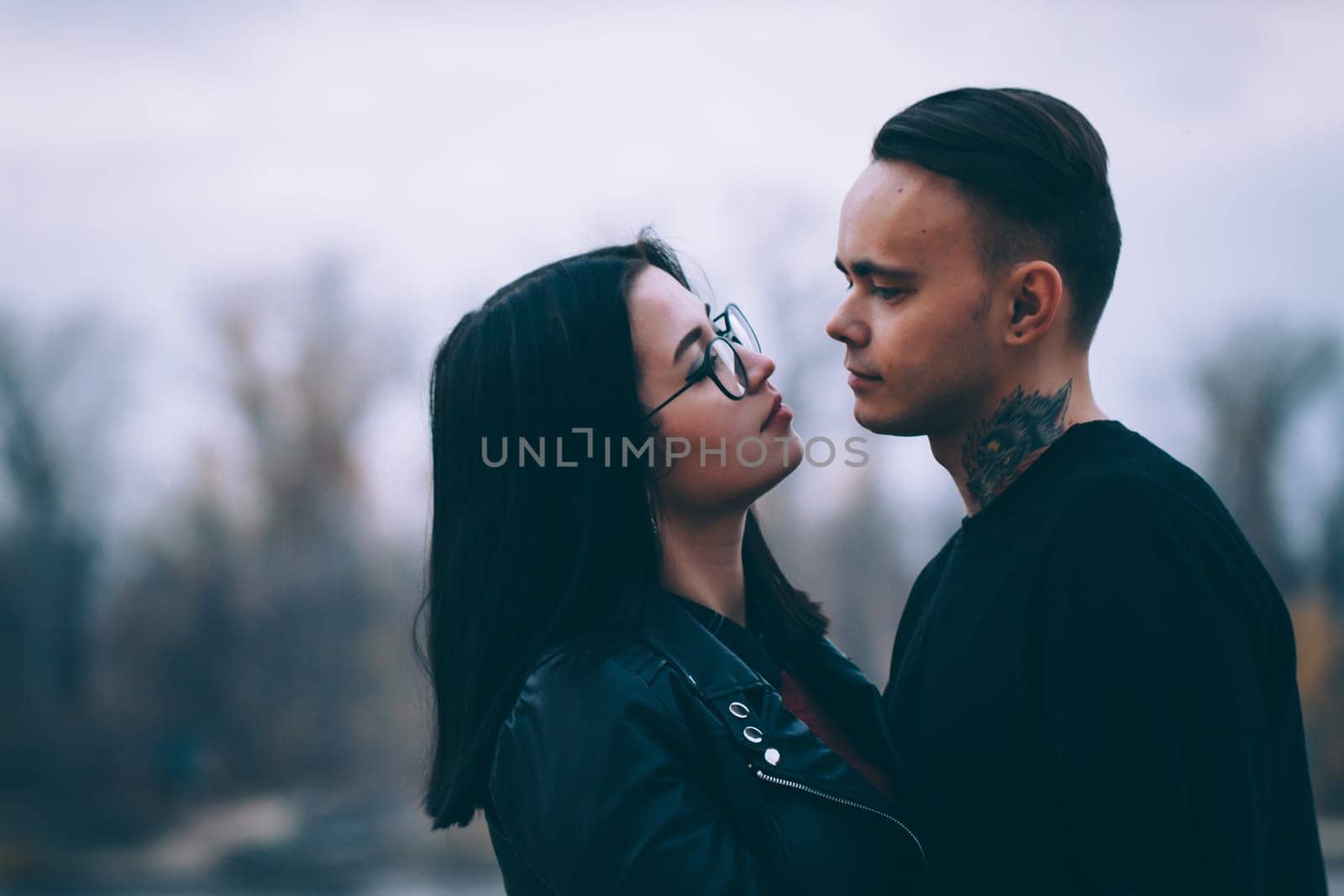man and woman near the river autumn.