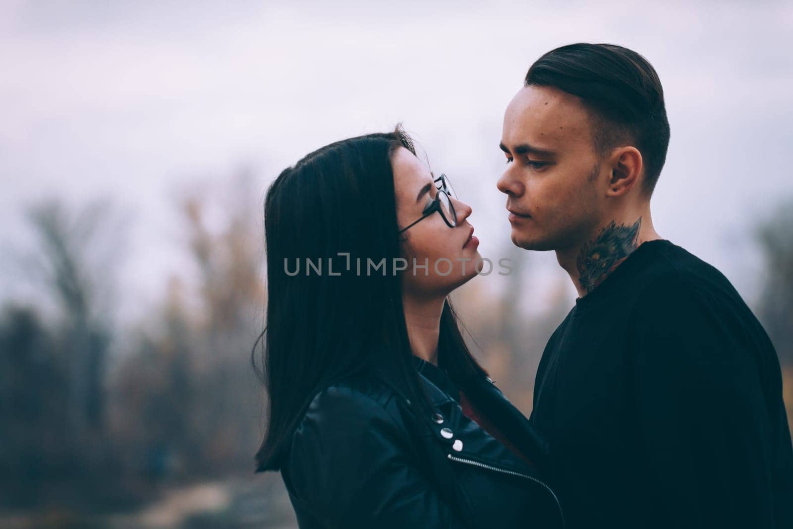 man and woman near the river autumn.