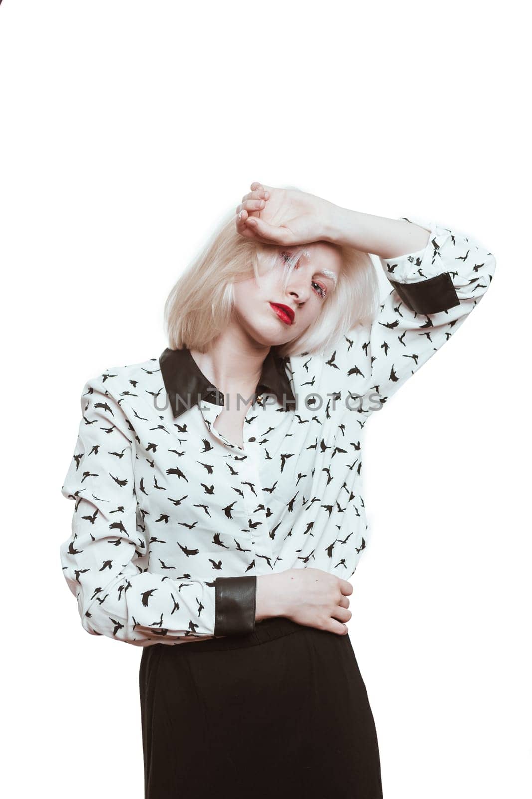 portrait blonde albino girl in studio on white background.
