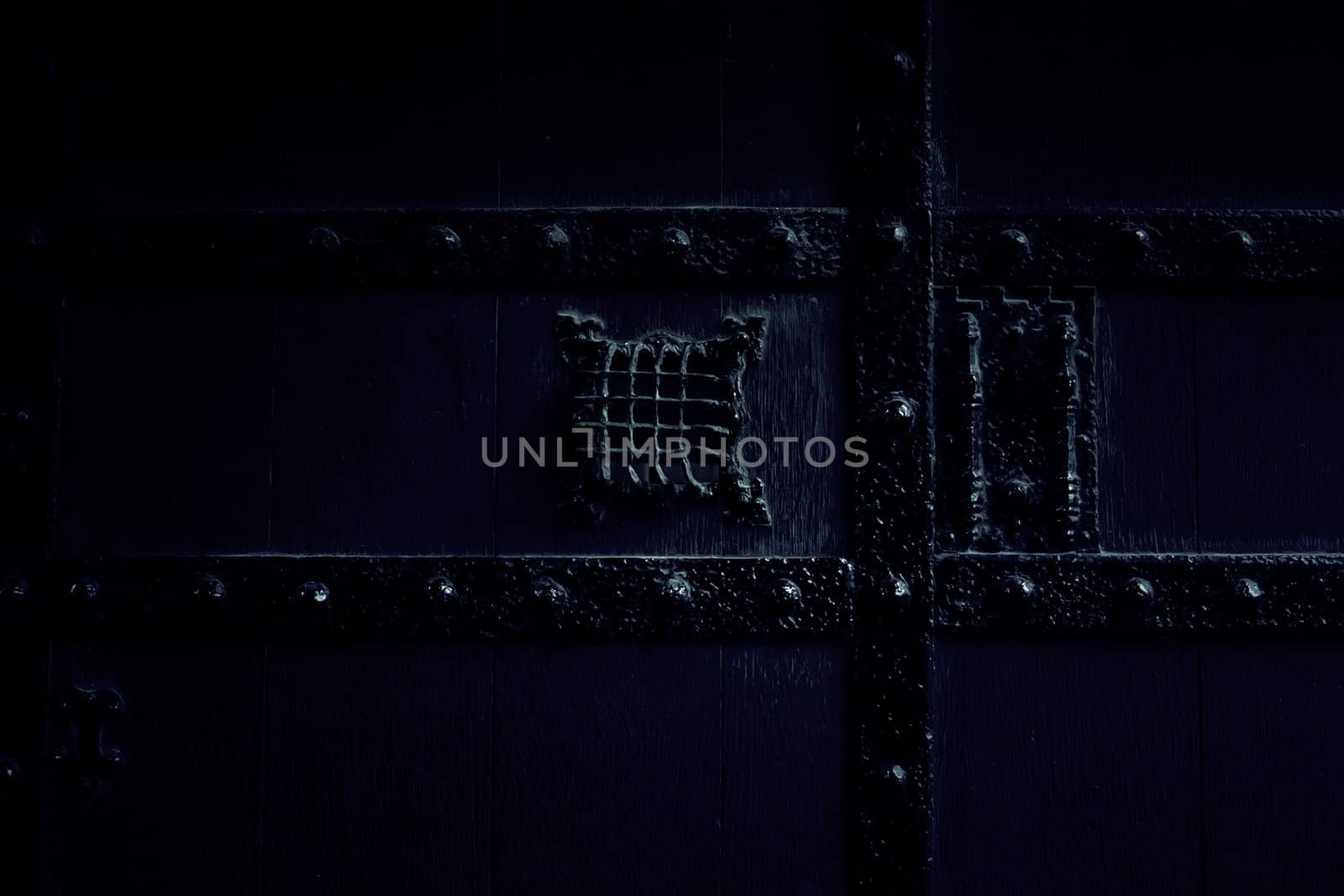 Ancient decorated metallic lock, detail of security and decoration