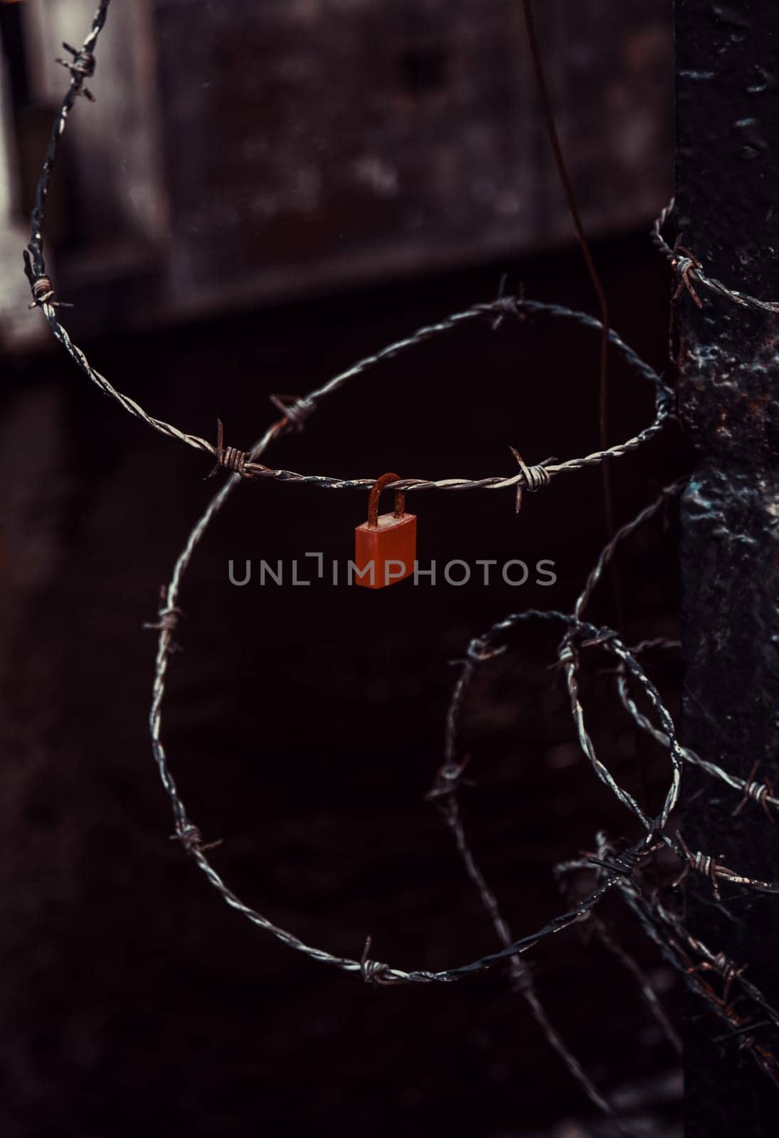 Padlock hanging on bridge, symbol of love, union