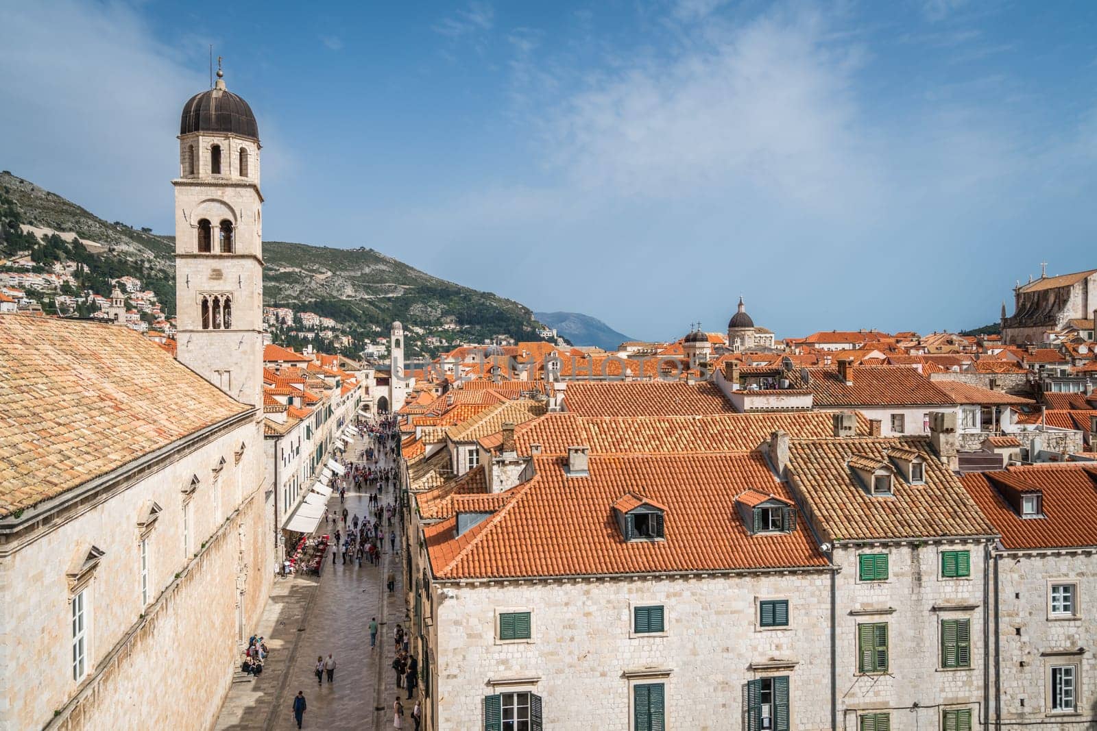 Dubrovnik, Croatia - April 2018 : Church bell tower and rooftops of old houses in Dubrovnik, viewed from the Old Town fortified walls