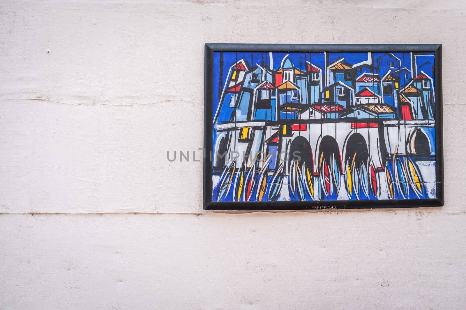 Dubrovnik, Croatia - April 2018 : Colorful painting on the white wall depicting marina in the Old Town Dubrovnik