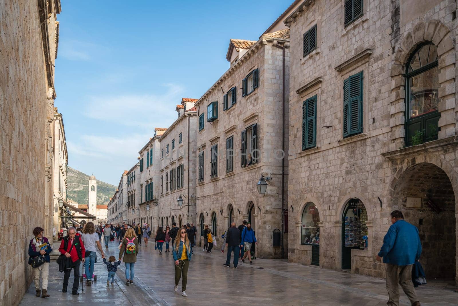 Dubrovnik, Croatia - April 2018 : Tourists walking, sightseeing or sitting in restaurants in the Dubrovnik Old Town