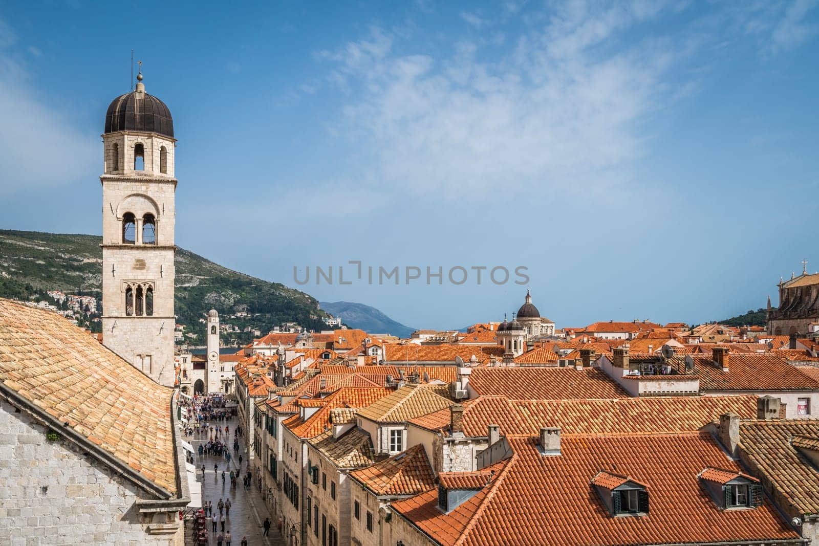 Dubrovnik, Croatia - April 2018 : Church bell tower and rooftops of old houses in Dubrovnik, viewed from the Old Town fortified walls