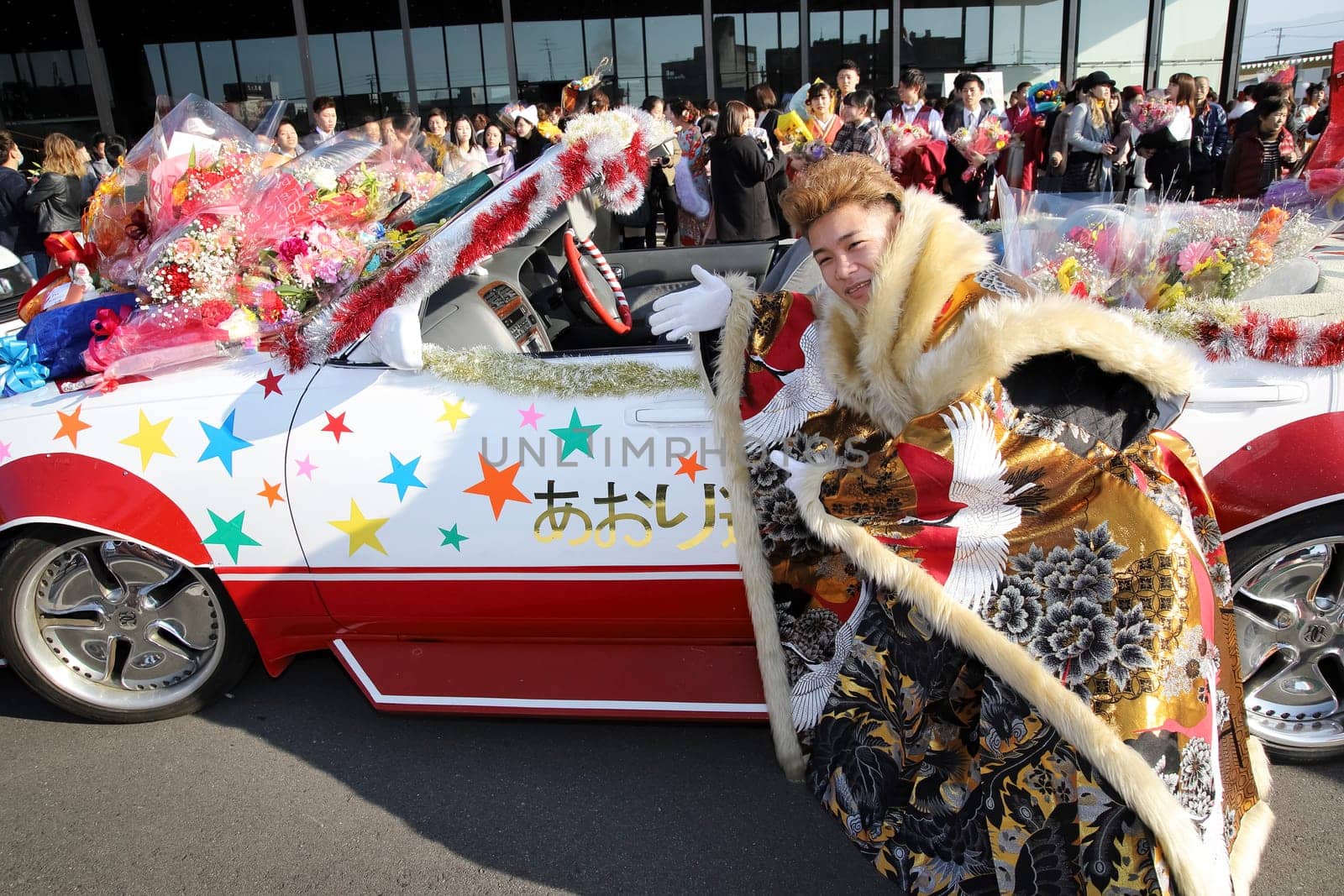 KAGAWA, JAPAN - JANUARY 13, 2019: Young Japanese man wearing traditional kimono for the coming of age day celebration, they turn twenty (seijinsiki, seijinshiki) in Kagawa, Japan.