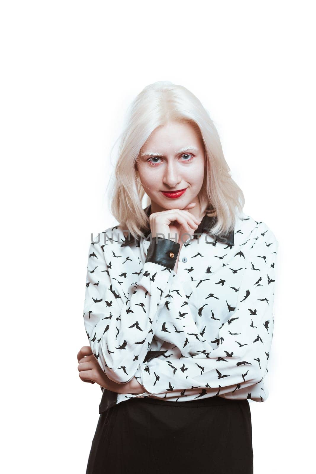 portrait blonde albino girl in studio on white background.