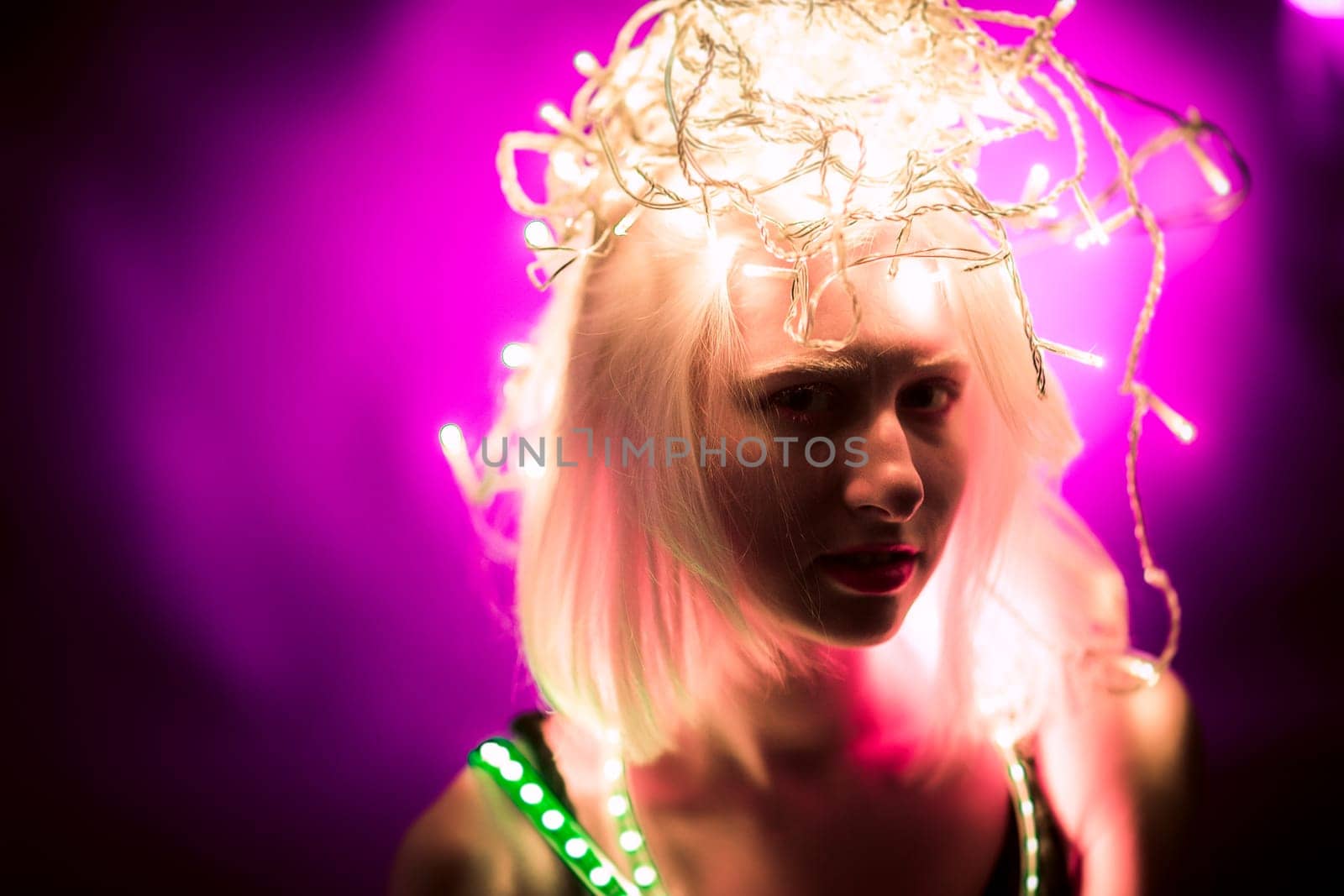 Portrait girl Strip Light LED tape on dark color background.