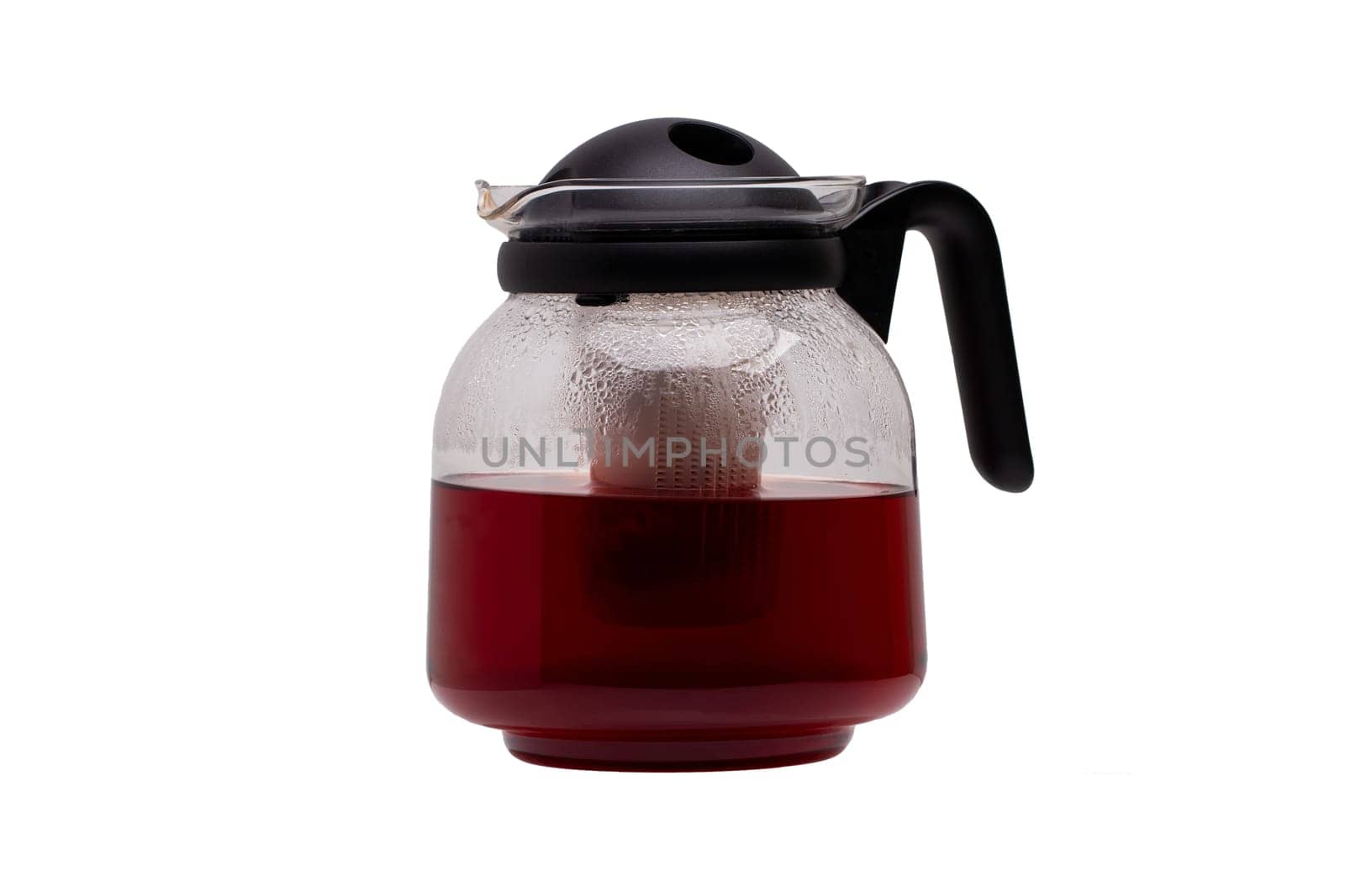 Teapot isolated.  Glass tea maker with a detachable plastic infuser isolated on a white background. Microwave glass jug with tea filter insert.