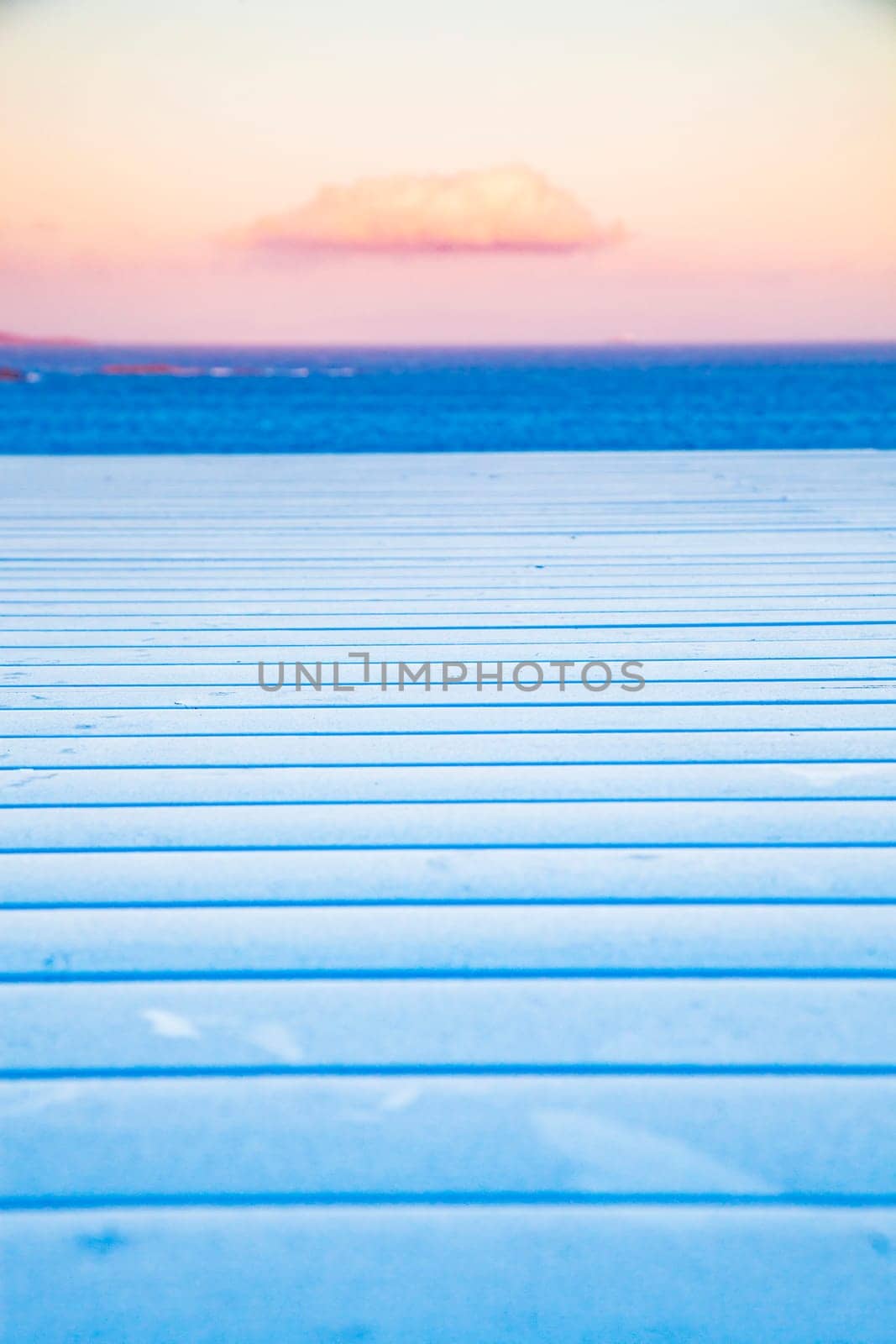 white wooden planks, sunset sky. sea