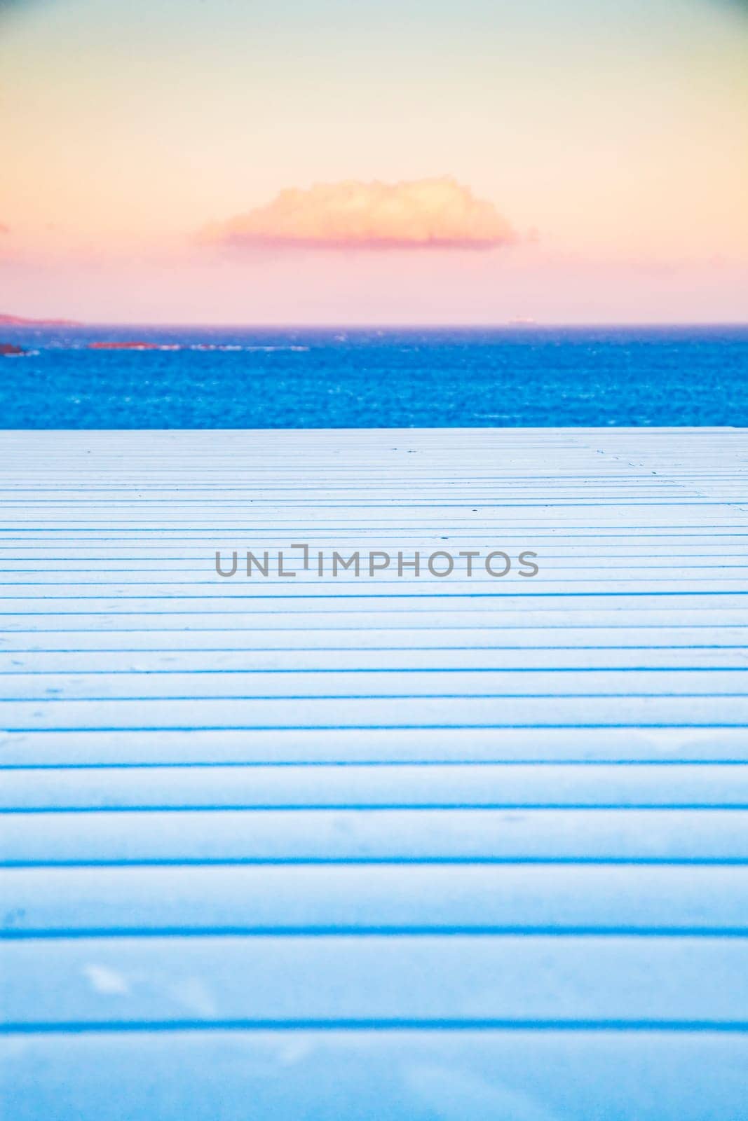 white wooden planks, sunset sky. sea
