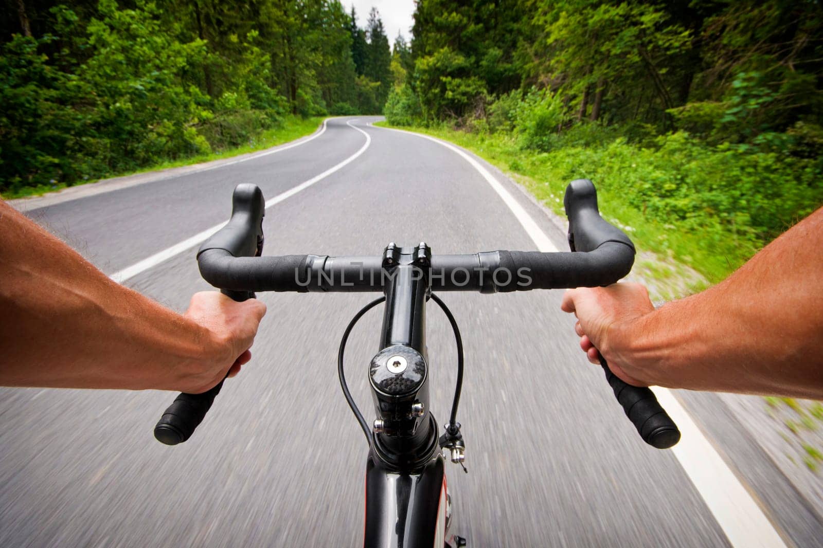 Road cycling wide angle speed shoot. Landscape cycling in road