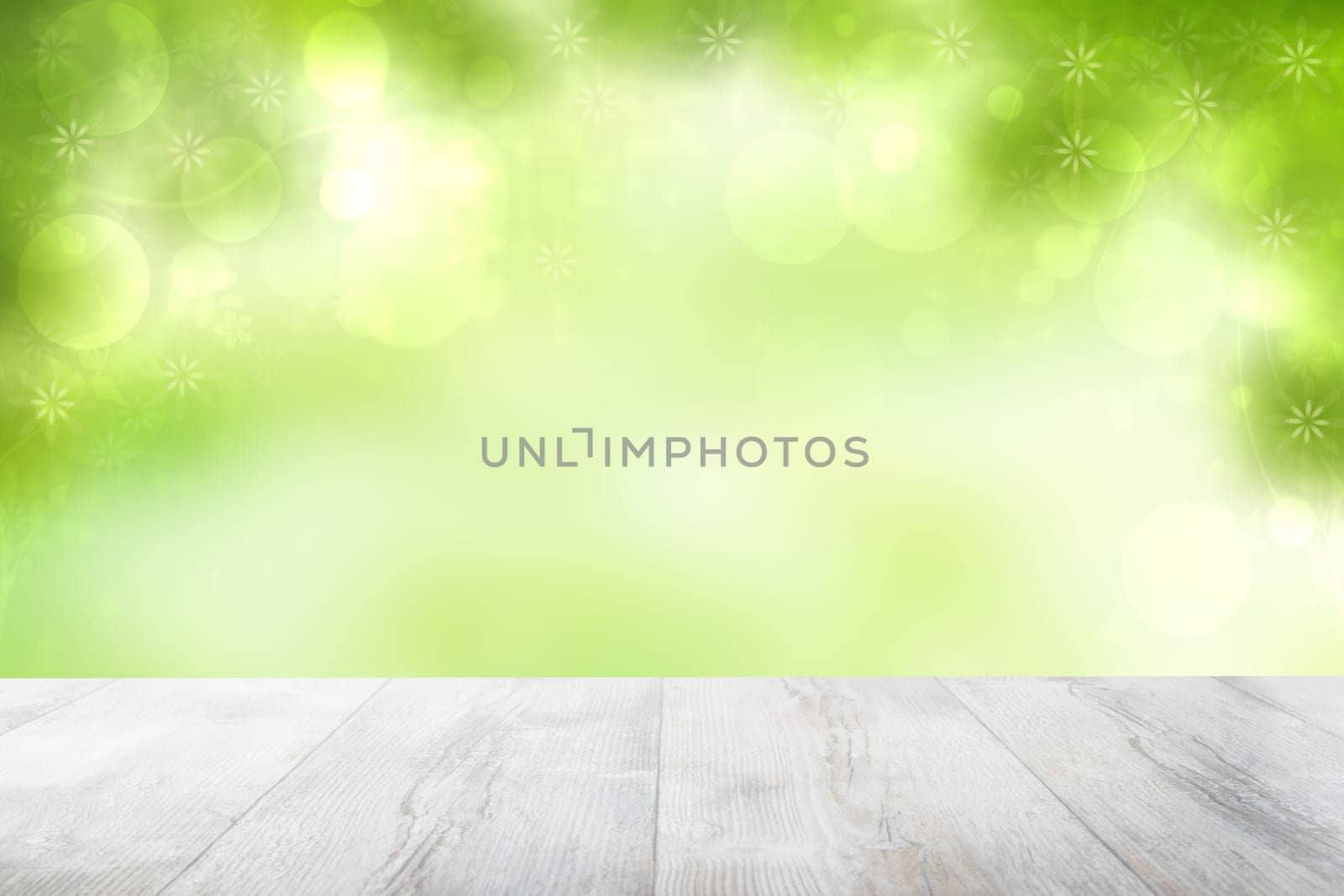 Empty table top summer background. Empty rustic wooden bright table top in front of beautiful abstract green summer or spring background. Template for product display montage. Space.