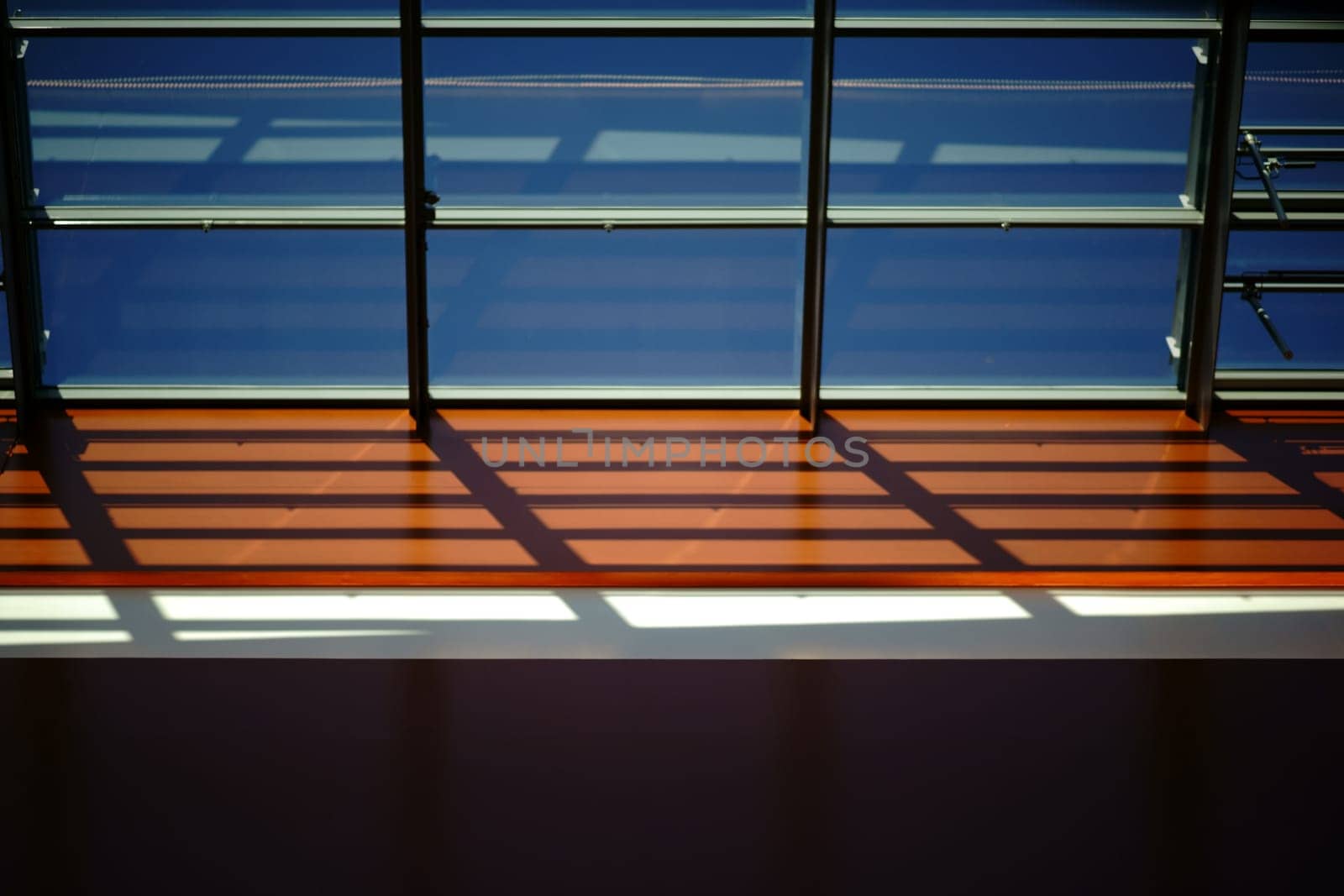 The detail of the edge of a modern roof construction roof panels and viewing windows...