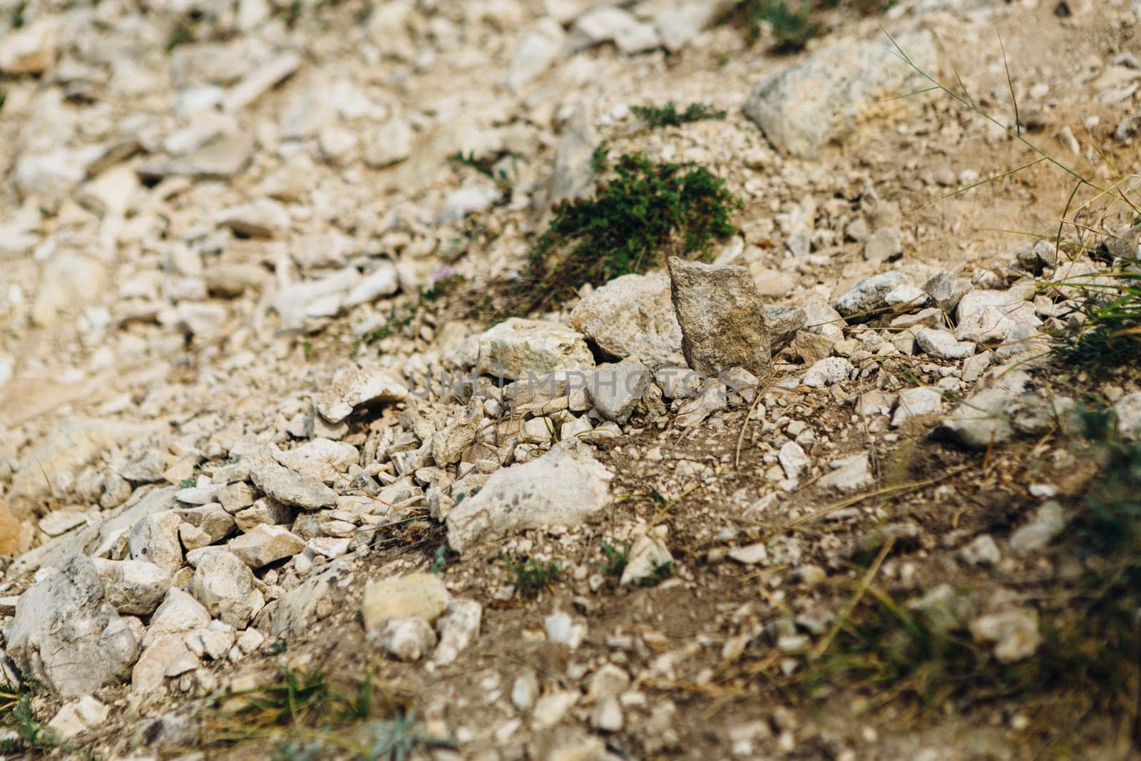 dark detailed grey stone background close up.