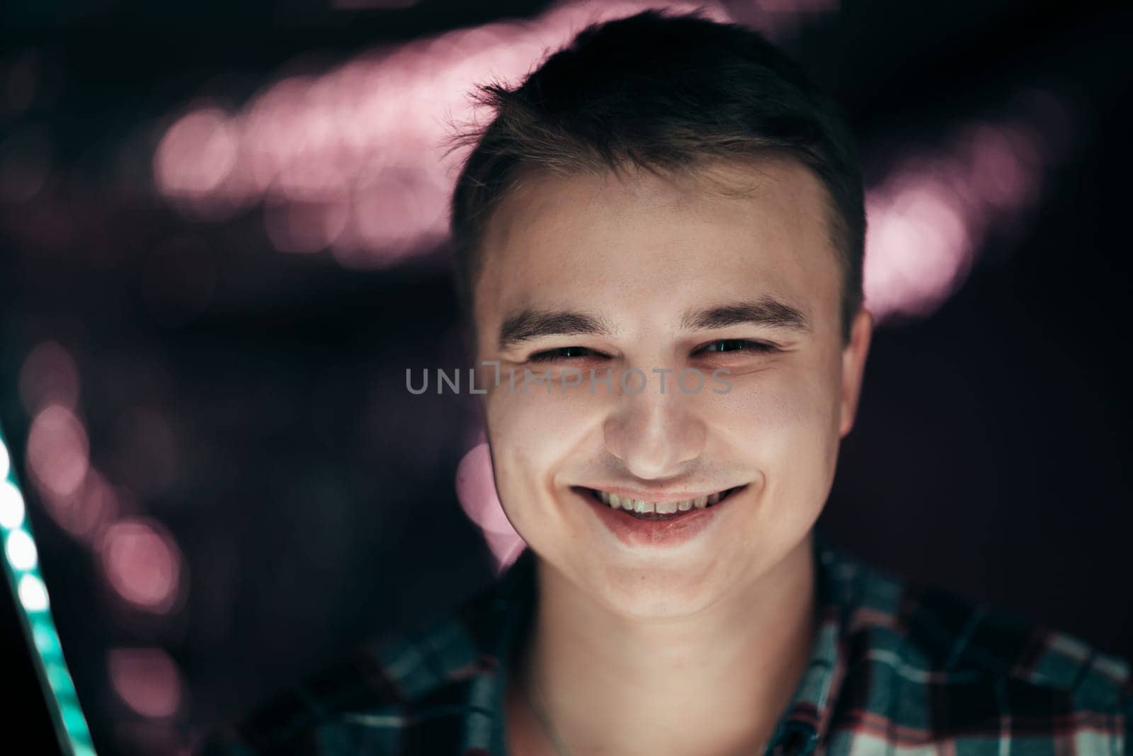 portrait of a young man on a blurred background.