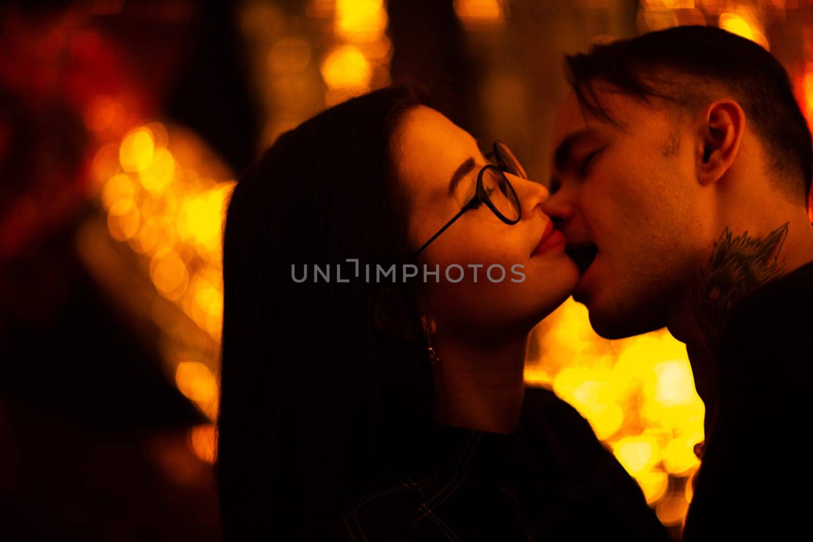 Girl and boyfriend on light sunshine background.